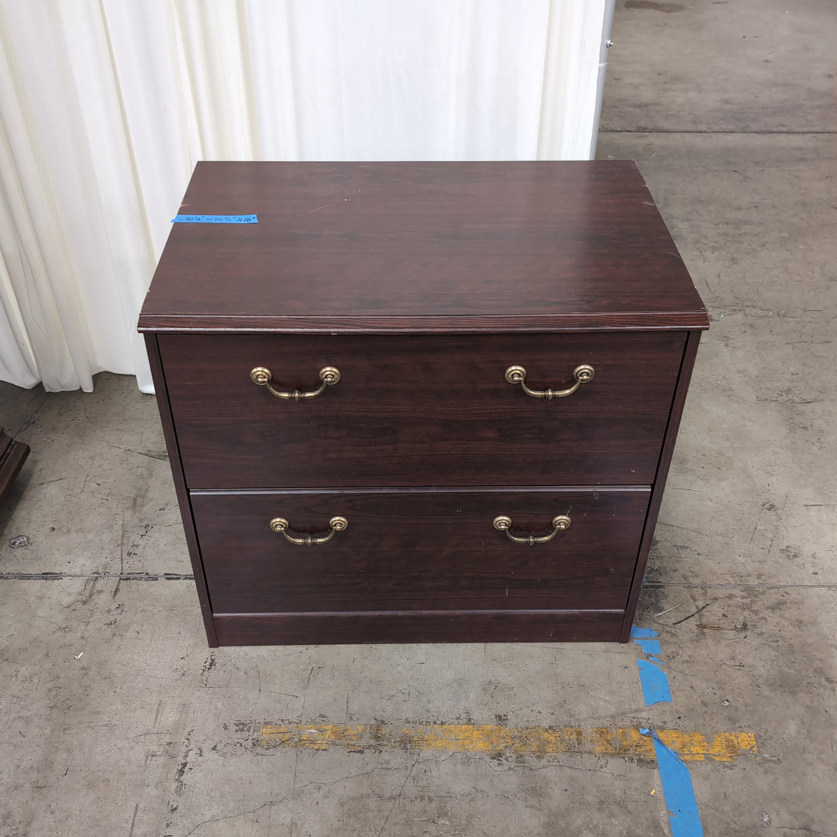 Dark Wood Two-Drawer Dresser with Ornate Hardware