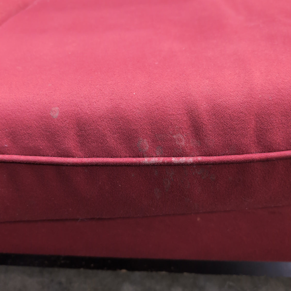 Red Upholstered Two-Cushion Fabric Loveseat with Dark Wood Base