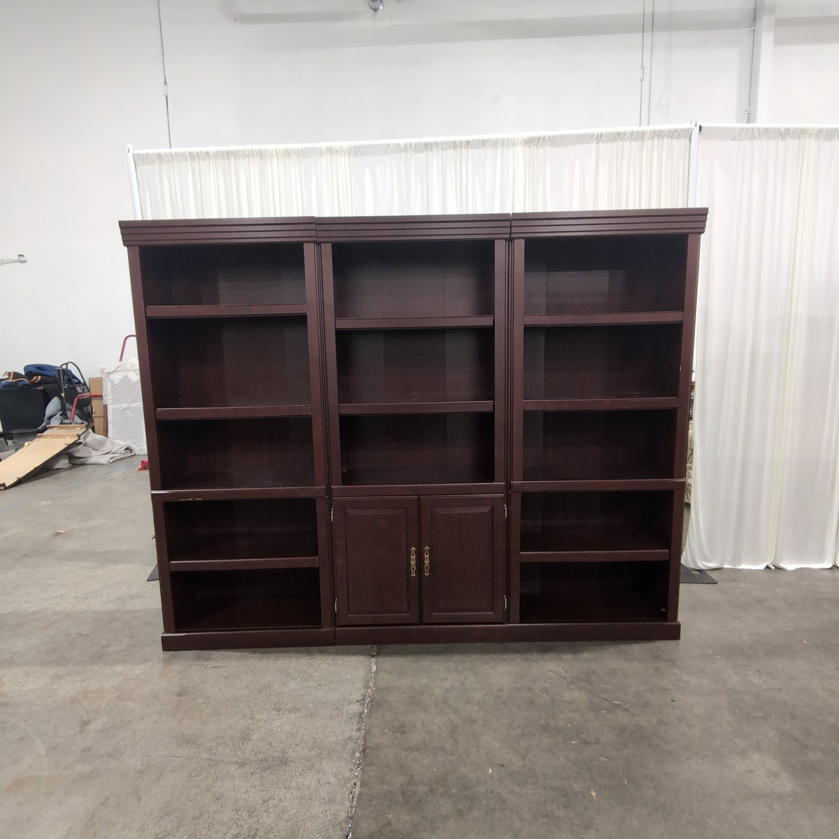 Sauder Dark Brown Three-Section Bookcase with Cabinet Doors
