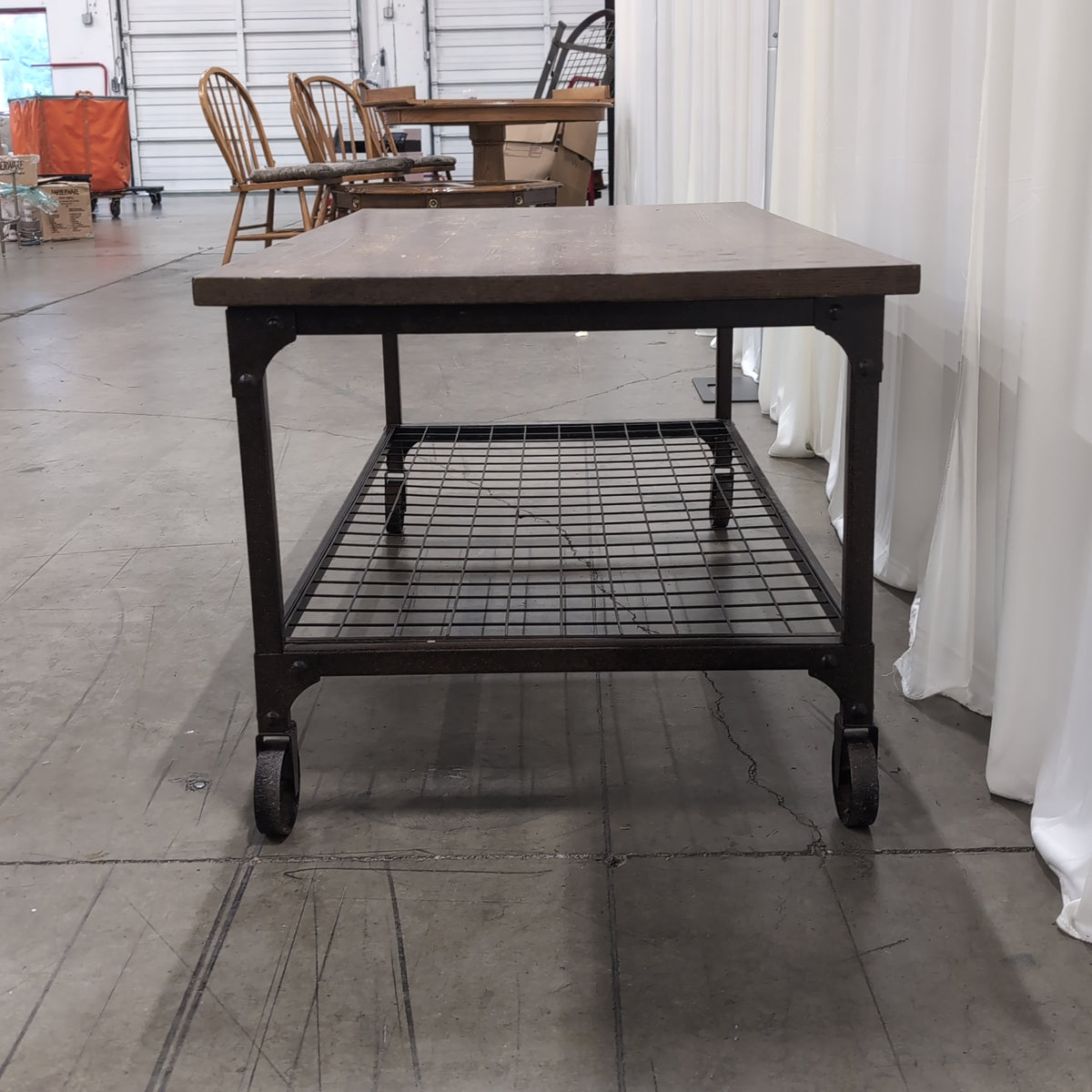 Industrial Wood and Metal Coffee Table with Wheels