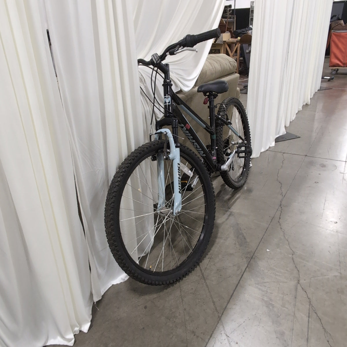 Black Nishiki Pueblo Mountain Bicycle with Front Suspension