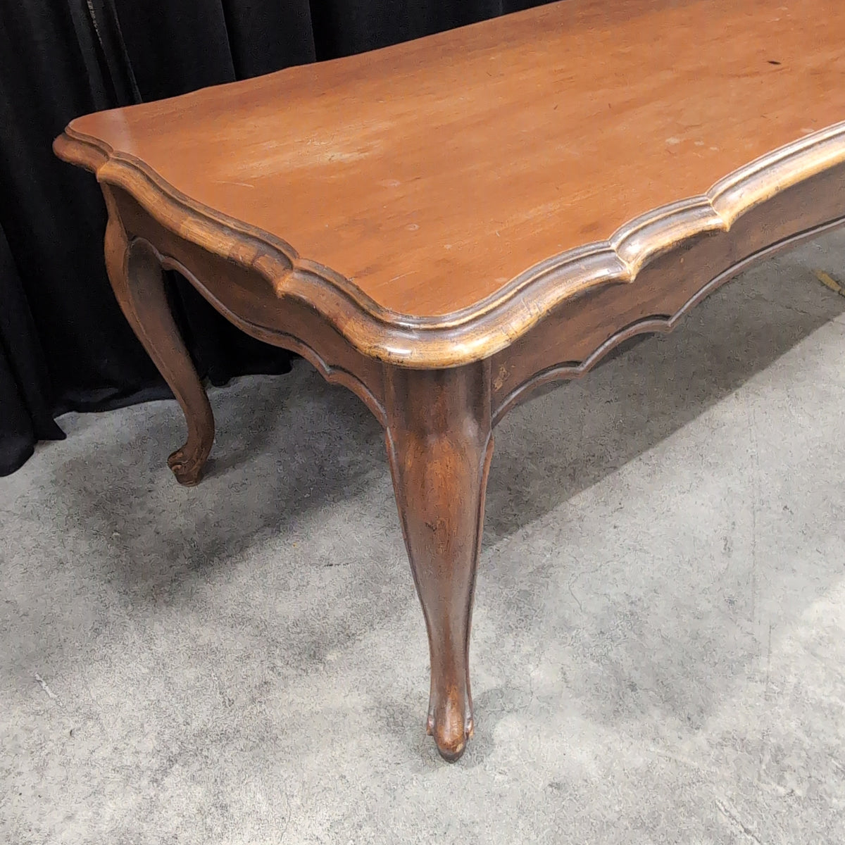 Traditional Light Wood Coffee Table with Carved Edges