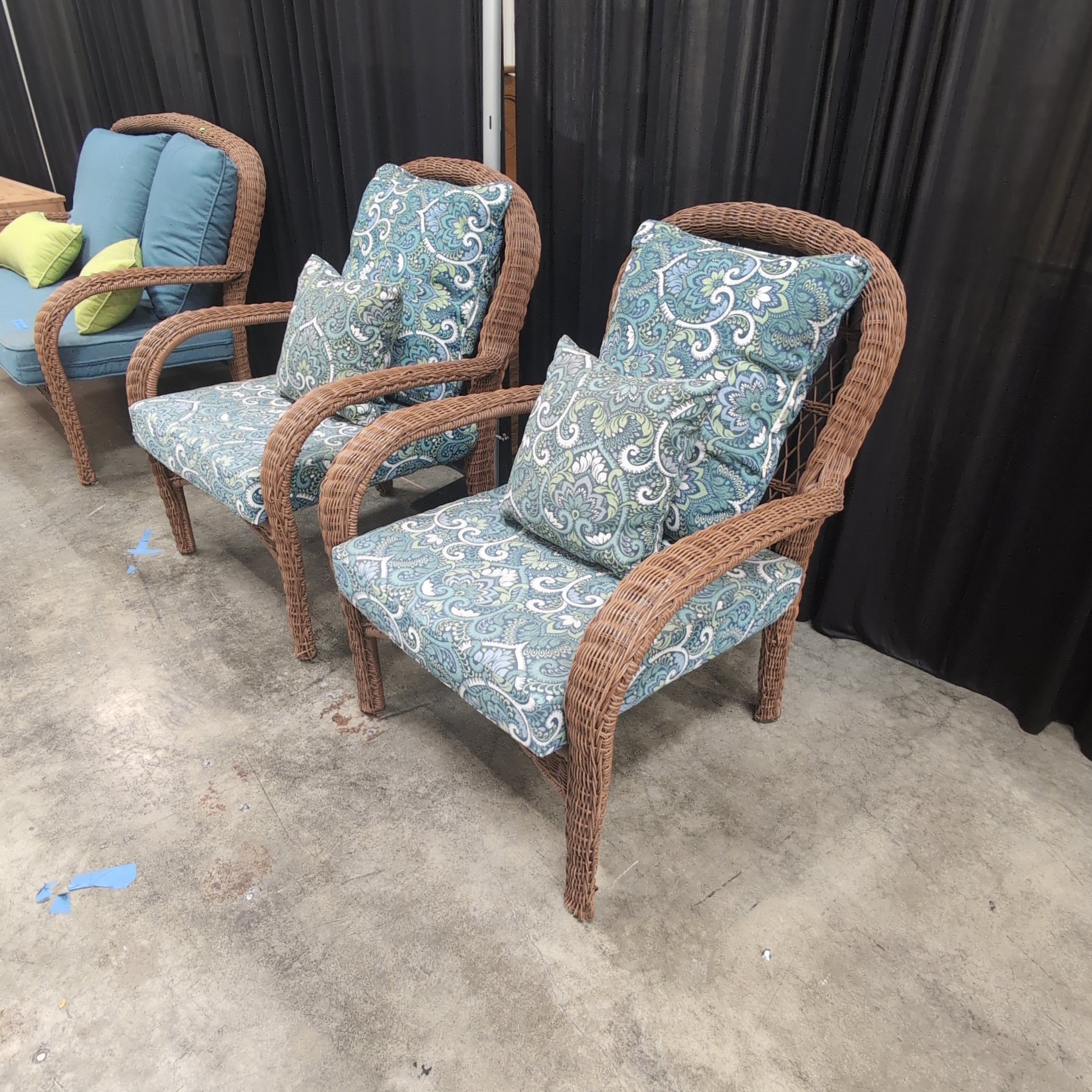 Pair of Brown Wicker Outdoor Chair with Patterned Cushions