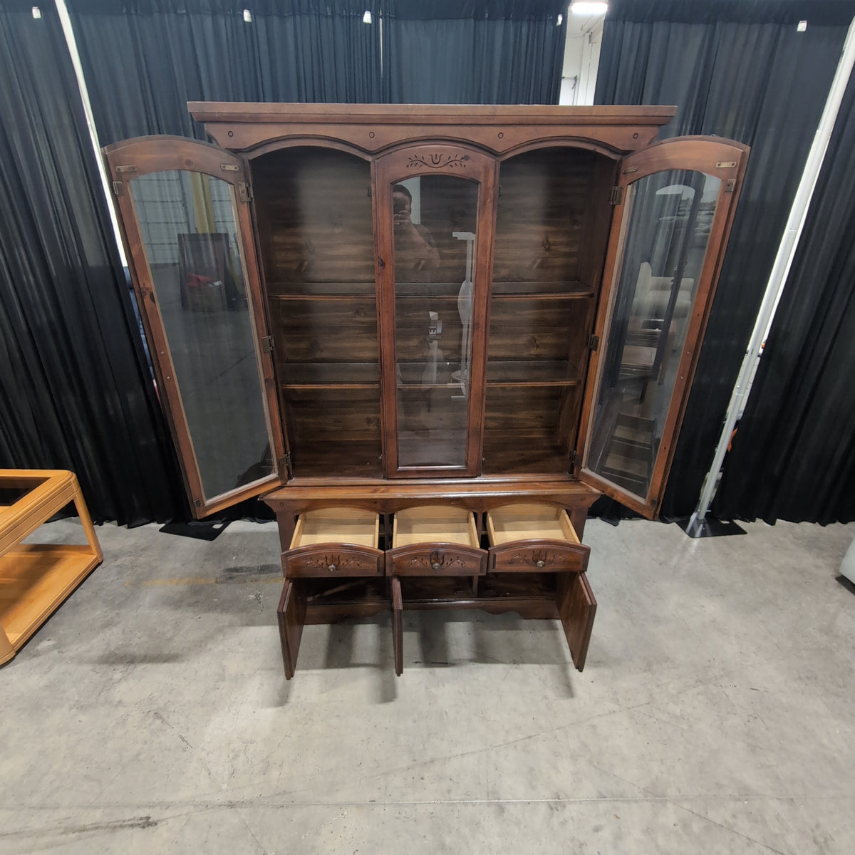 Brown Wood China Cabinet with Ornate Carvings