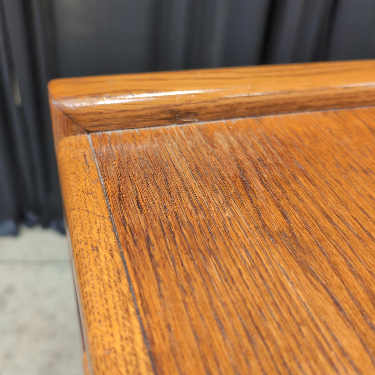 Brown Wood Nightstand with Slatted Drawer