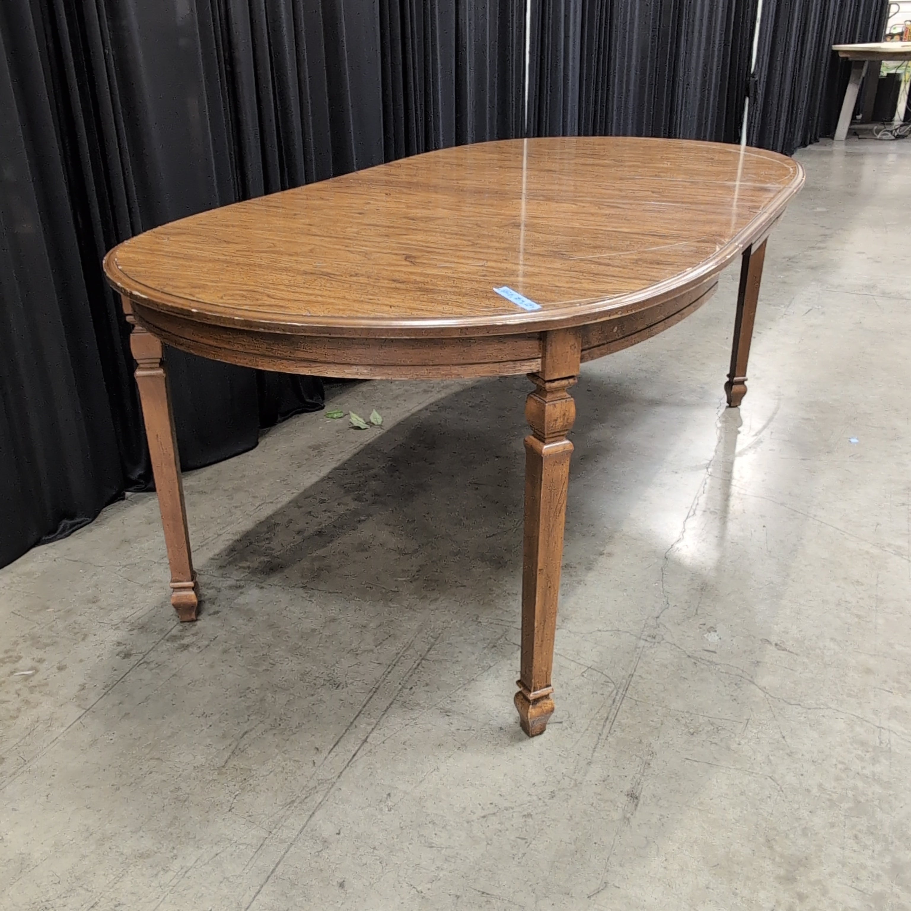 Oval Wood Dining Table with Turned Legs