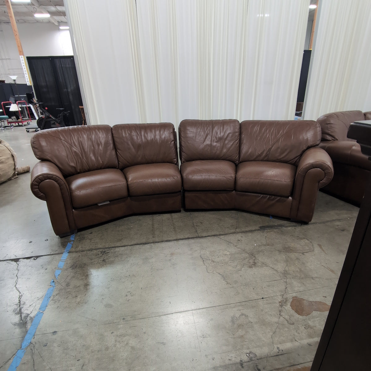 Brown Leather Curved Sectional Couch