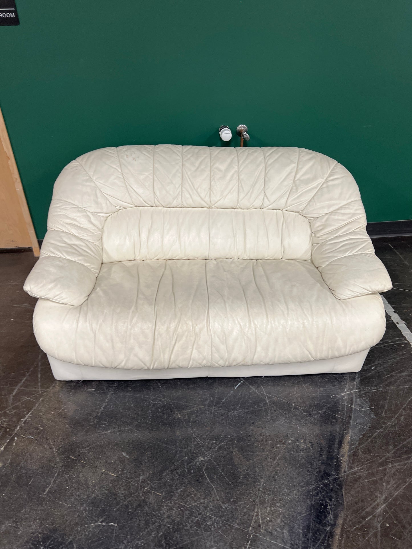 Cream-Colored Leather Loveseat