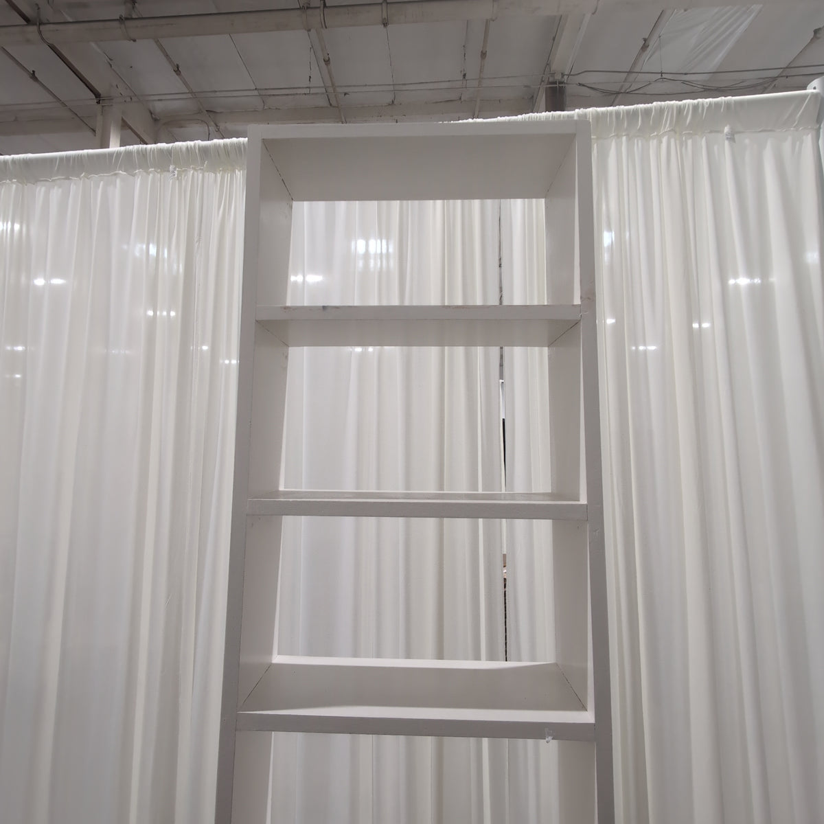 White Open Ladder-Style Bookcase with Multiple Shelves