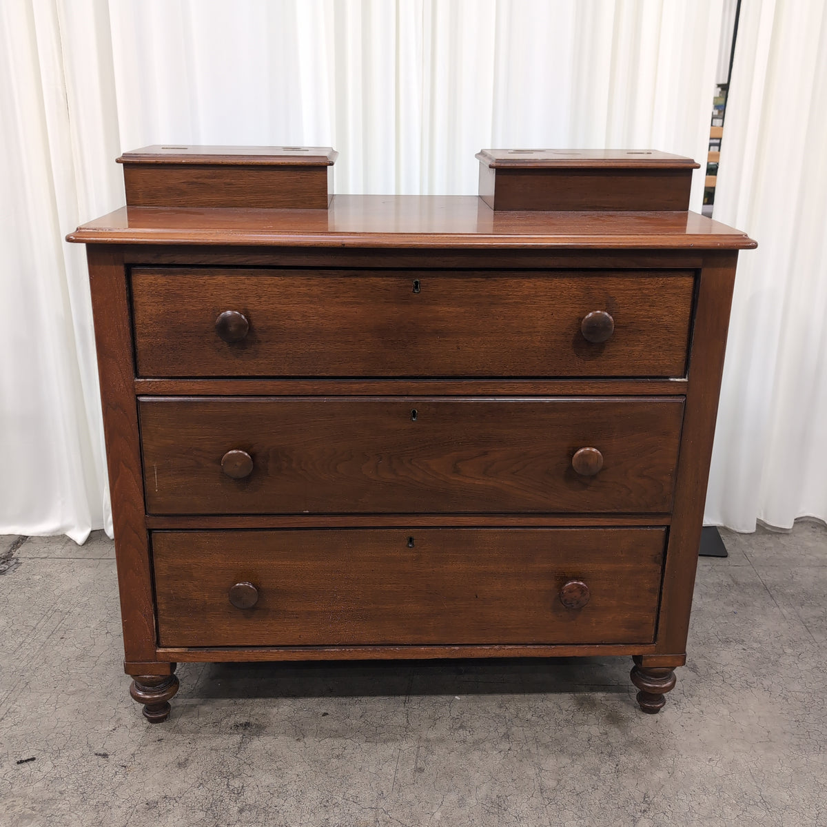 Traditional Reddish-Brown Wood Nightstand with Three Drawers
