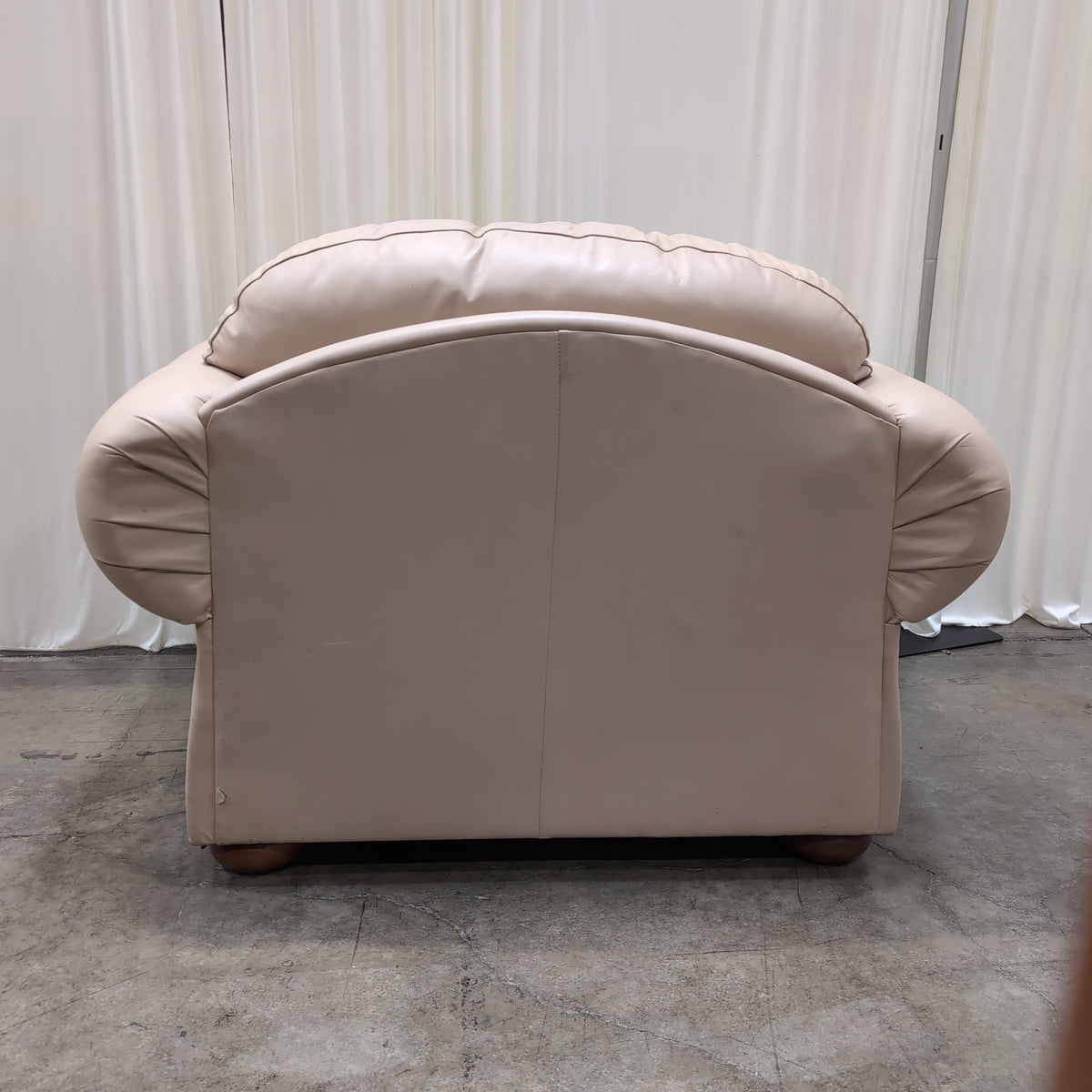 Padded Tan Armchair with Rolled Arms
