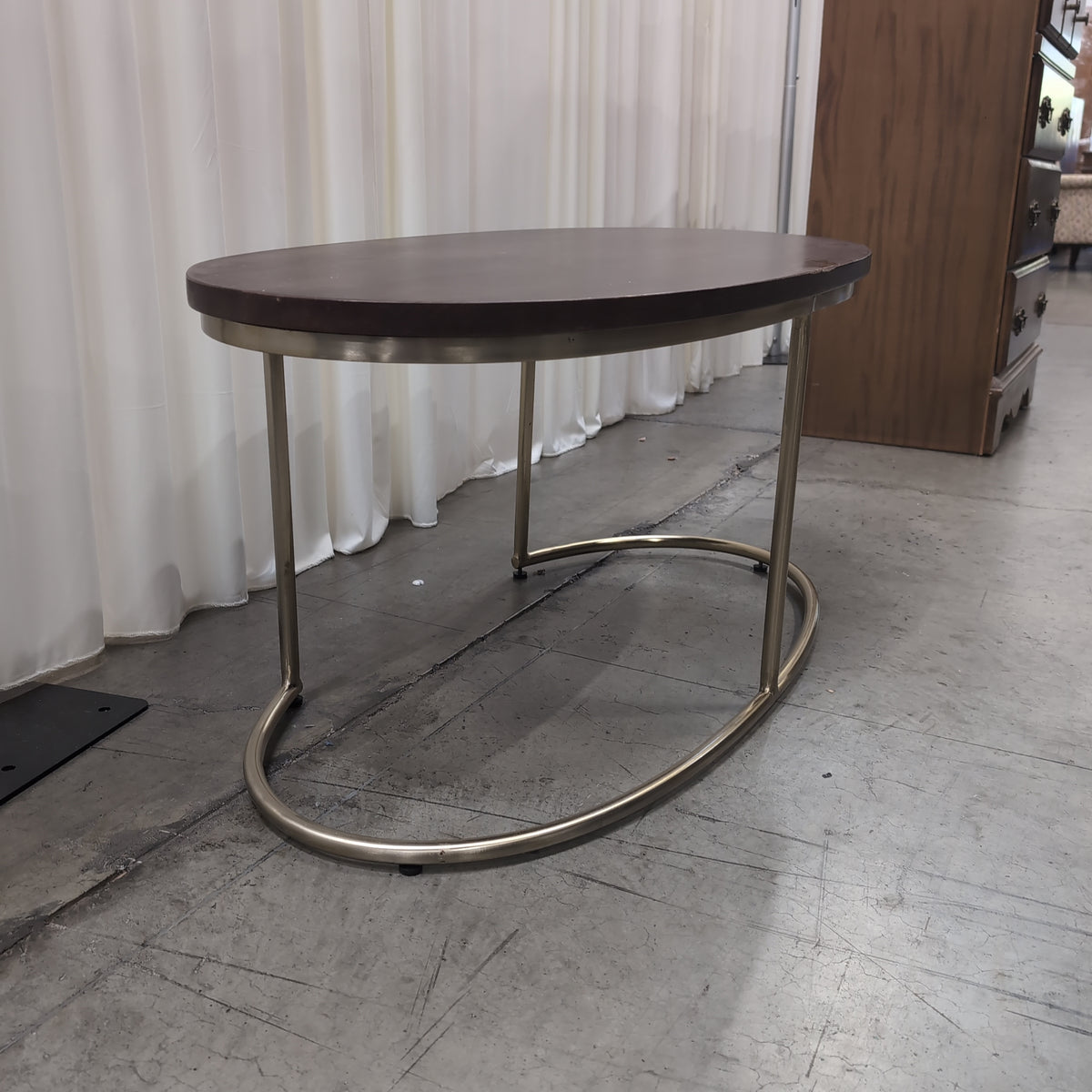 Oval Dark Wood Coffee Table with Gold Metal Base