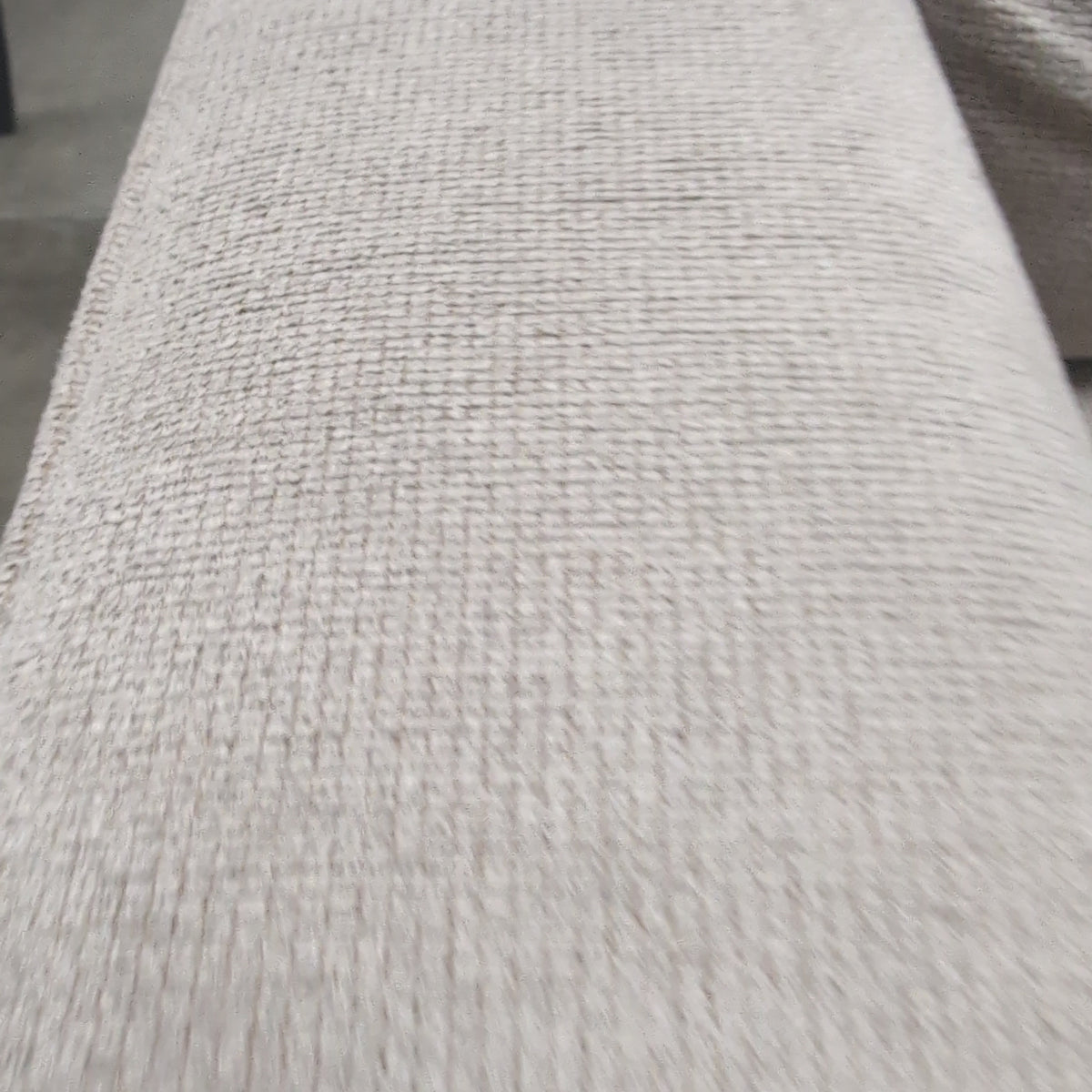 Light Beige Upholstered Three-Seat Couch