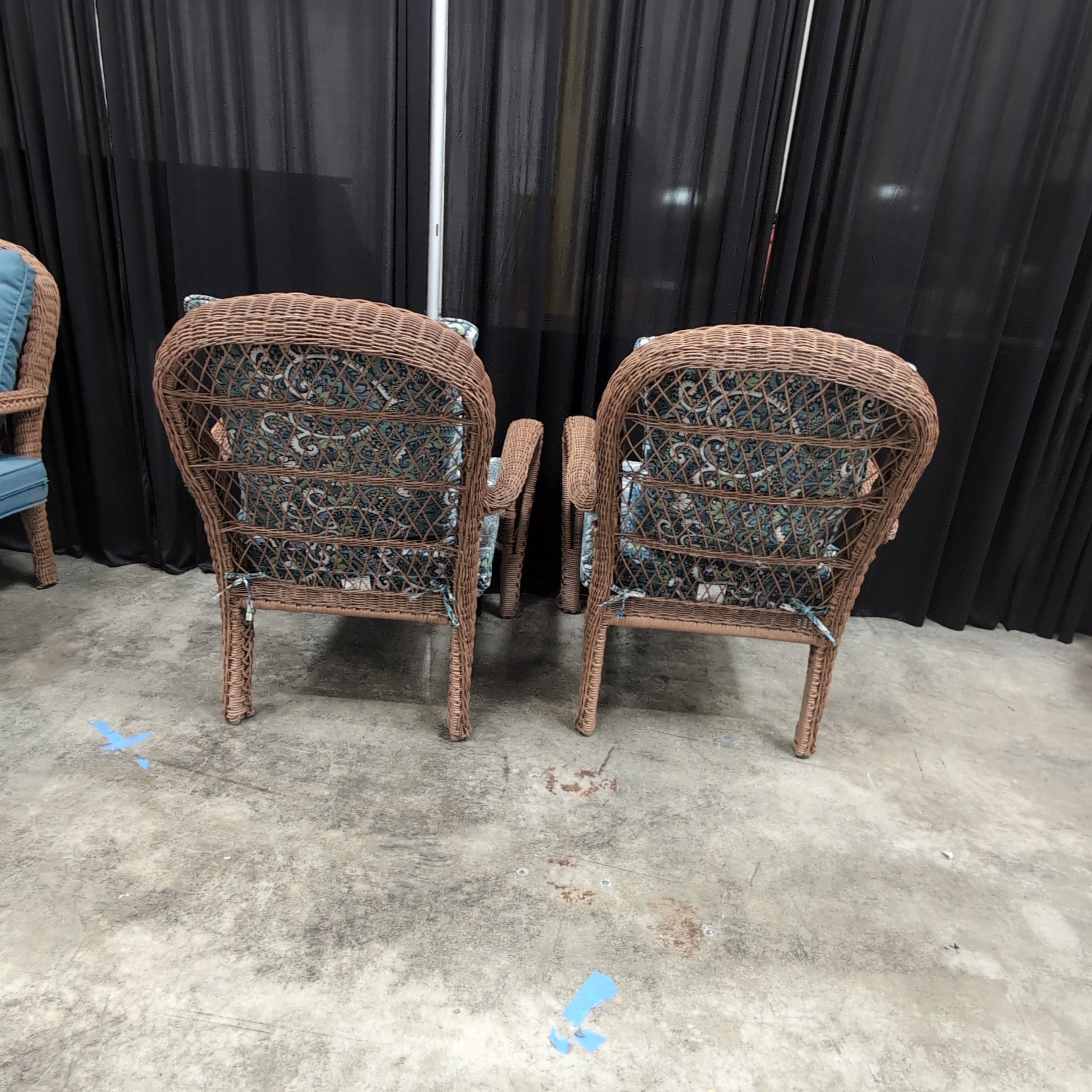 Pair of Brown Wicker Outdoor Chair with Patterned Cushions