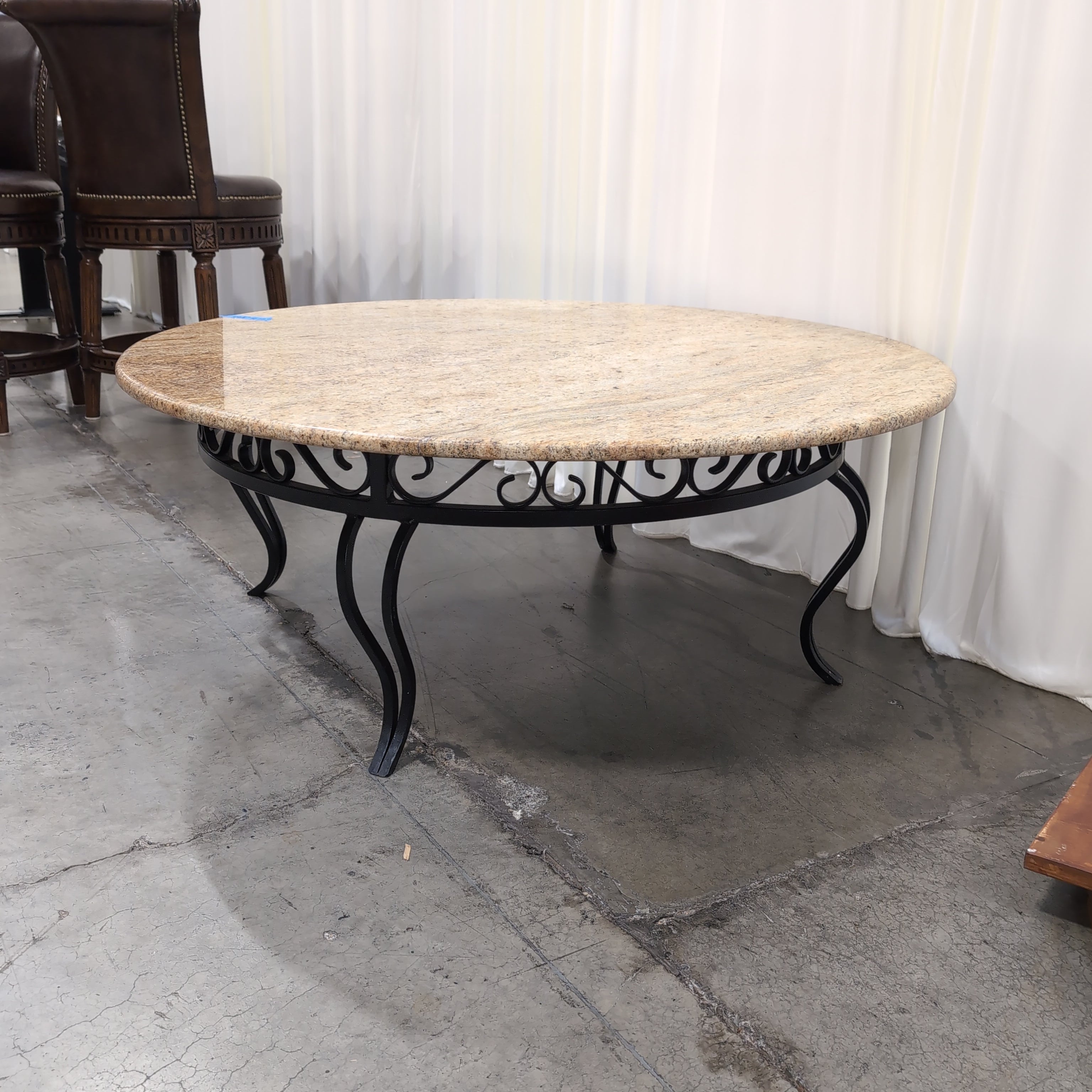 Oval Pink Speckled Granite Coffee Table with Wood Base