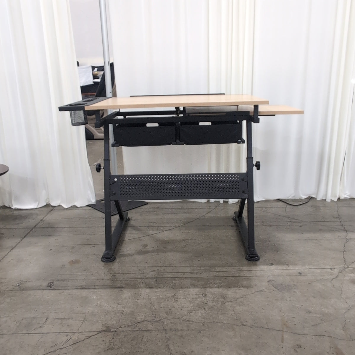 Adjustable Light Wood-Tone Drafting Desk with perforated shelf