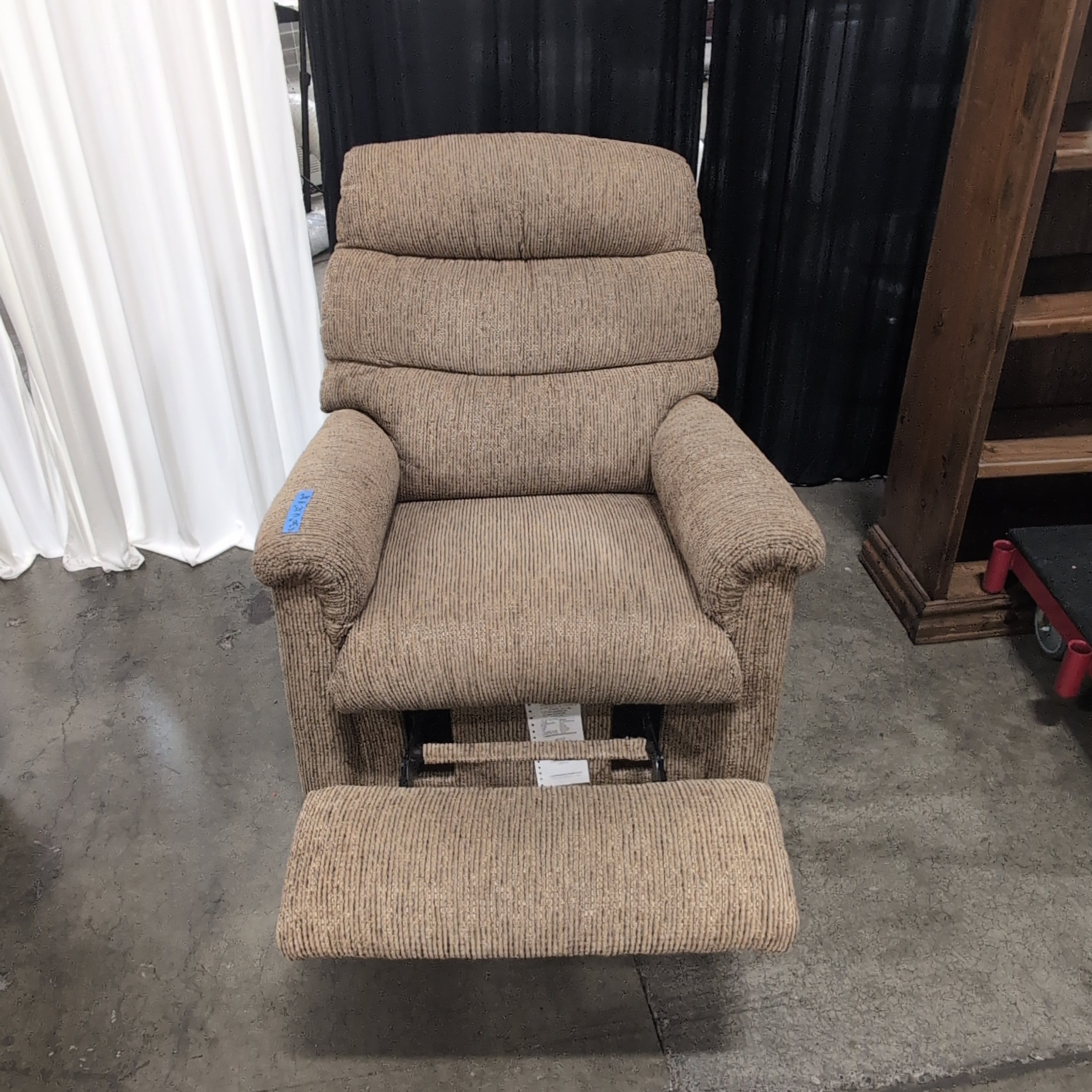 Tan Textured Fabric Recliner with Rolled Arms