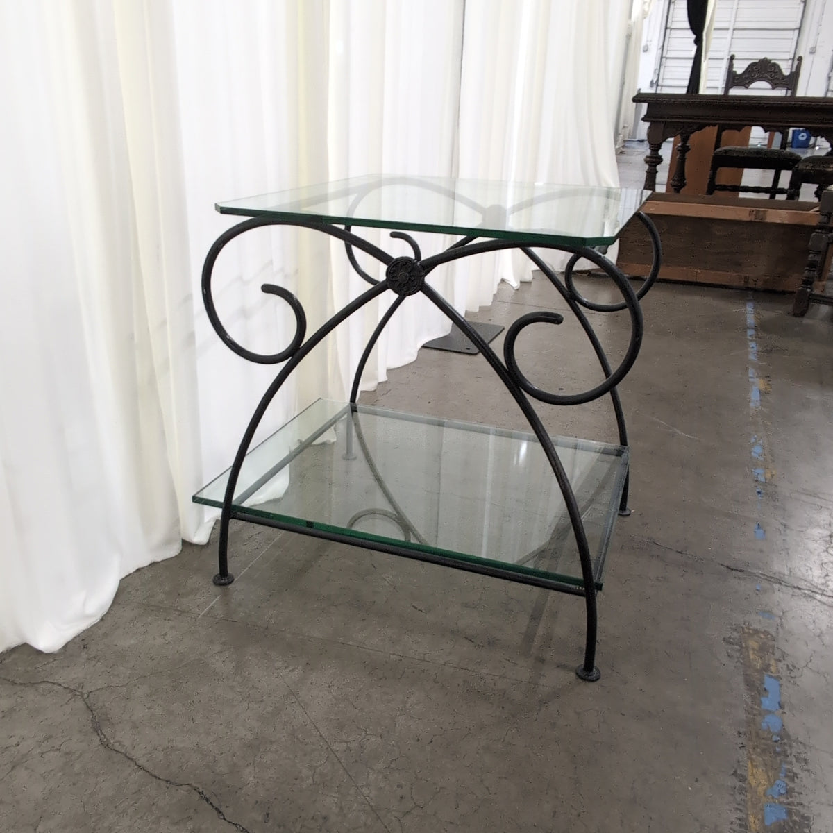 Dark Metal Two-Tiered End Table with Glass Shelves