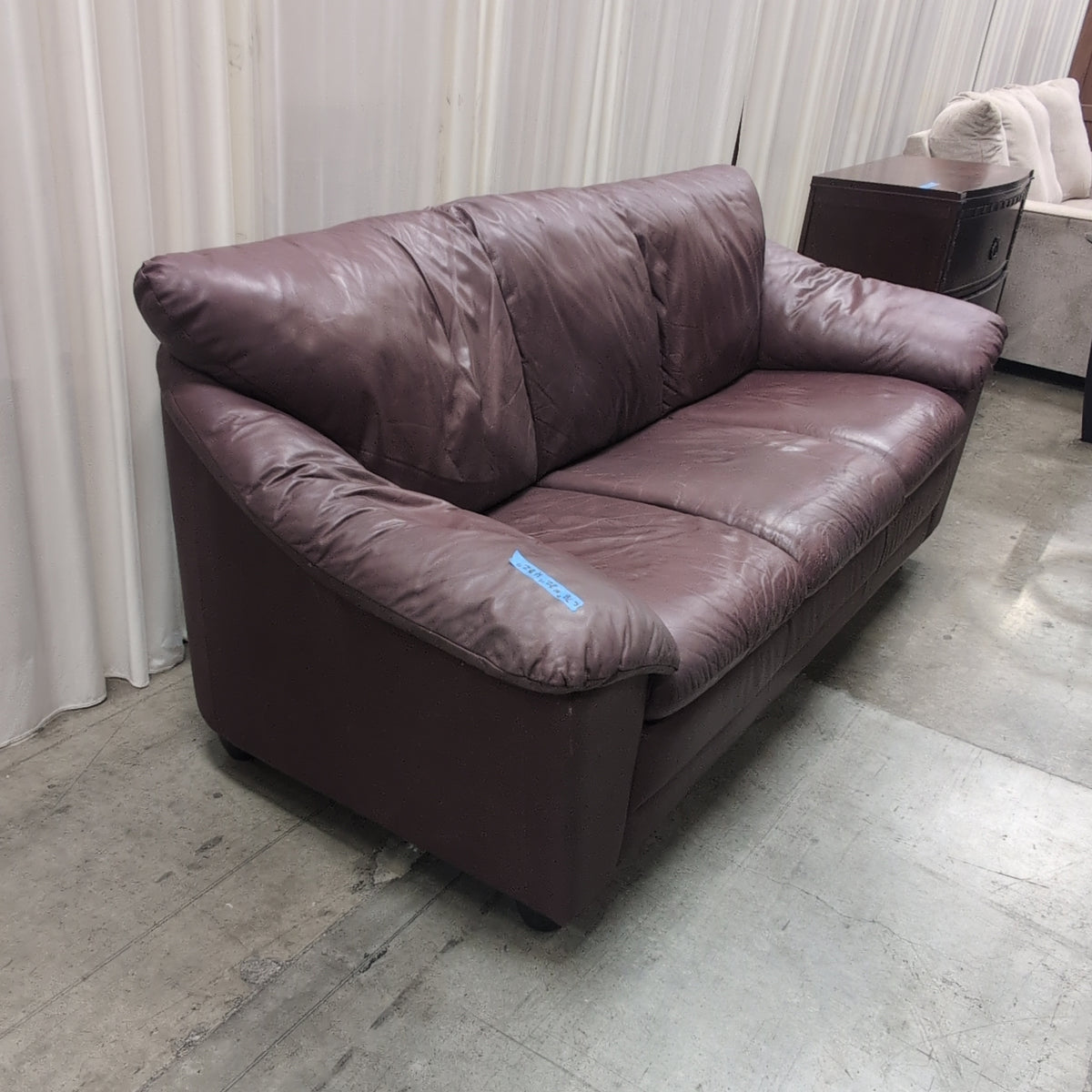 Burgundy Padded Leather Couch