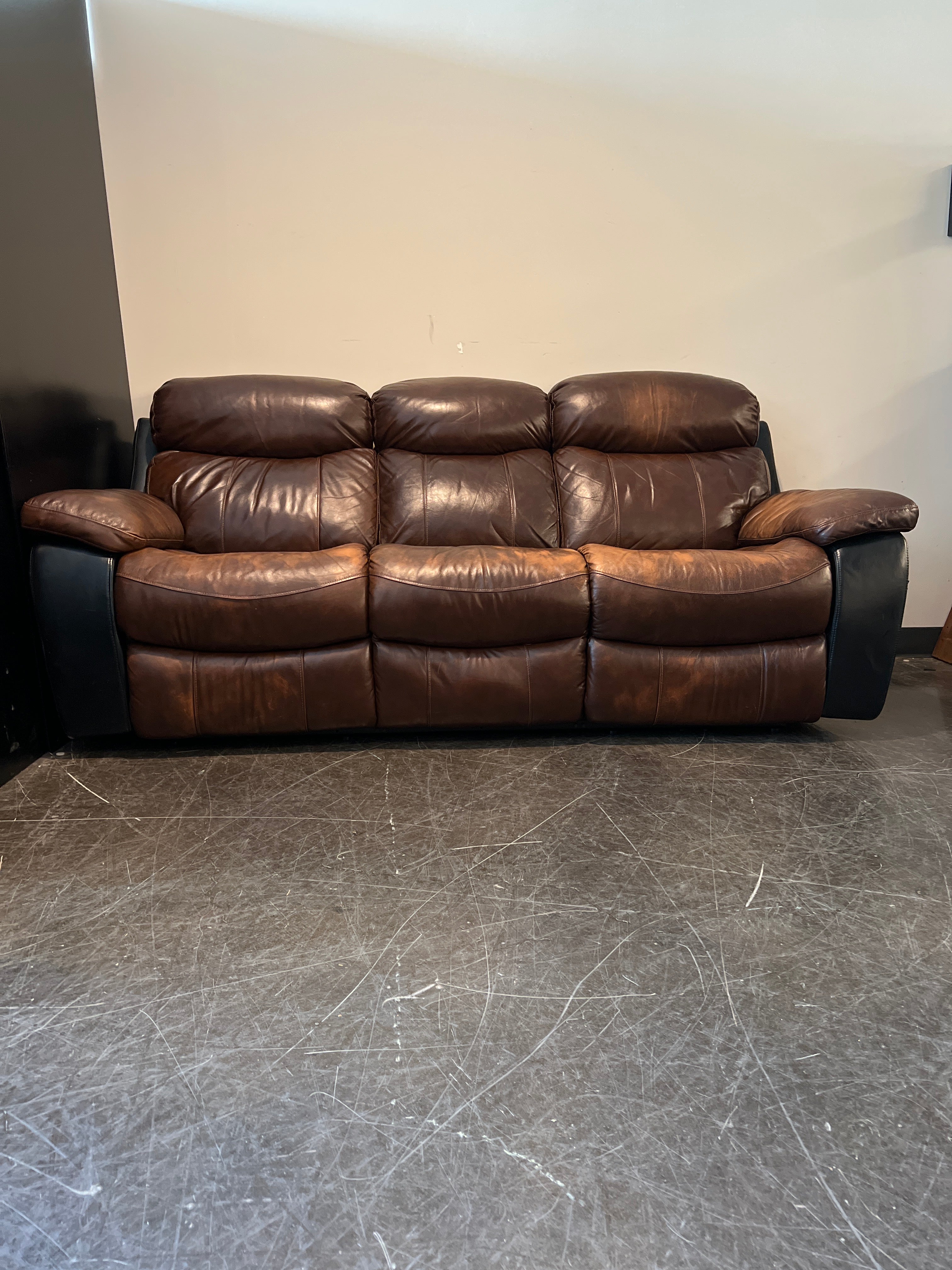 Brown Leather Reclining Sofa