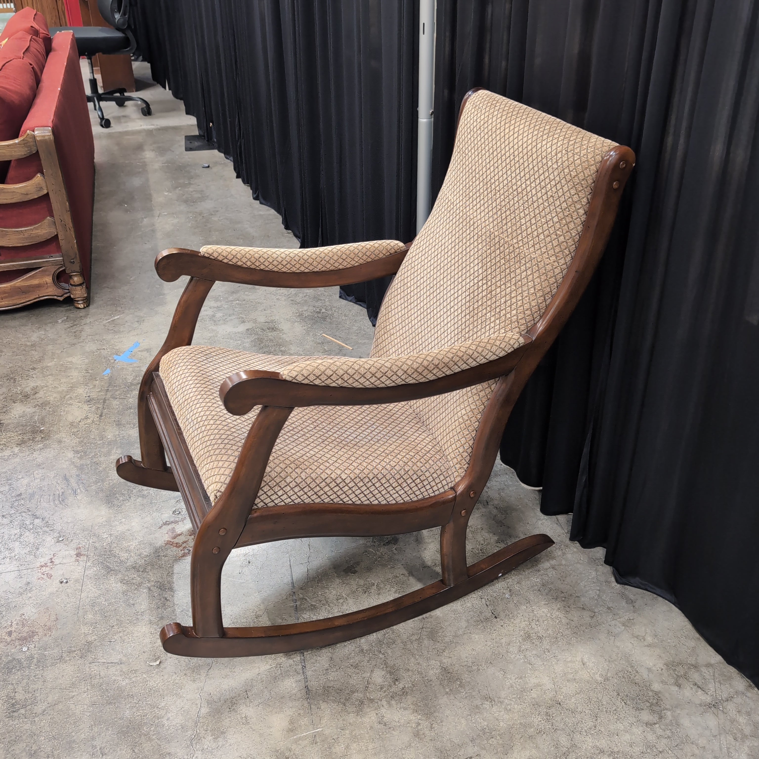 Traditional Dark Wood Rocking Chair with Patterned Upholstery