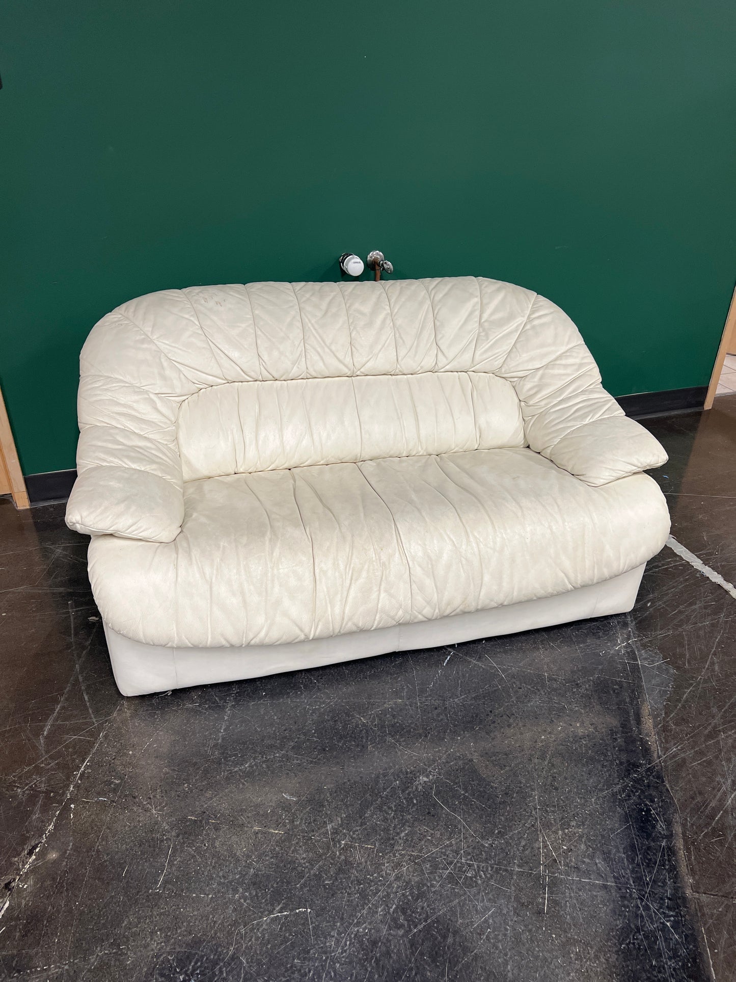 Cream-Colored Leather Loveseat