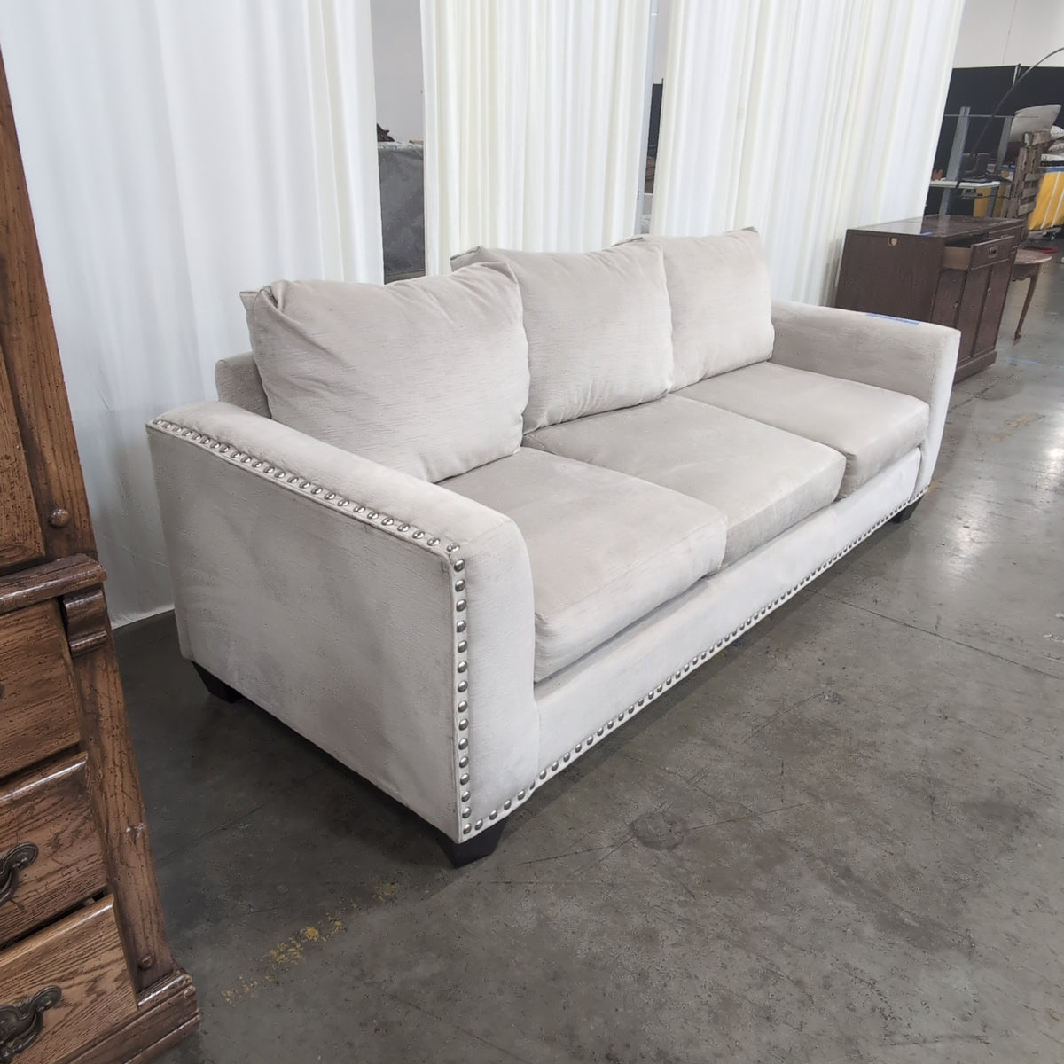 Light Beige Microfiber Couch with Nailhead Trim