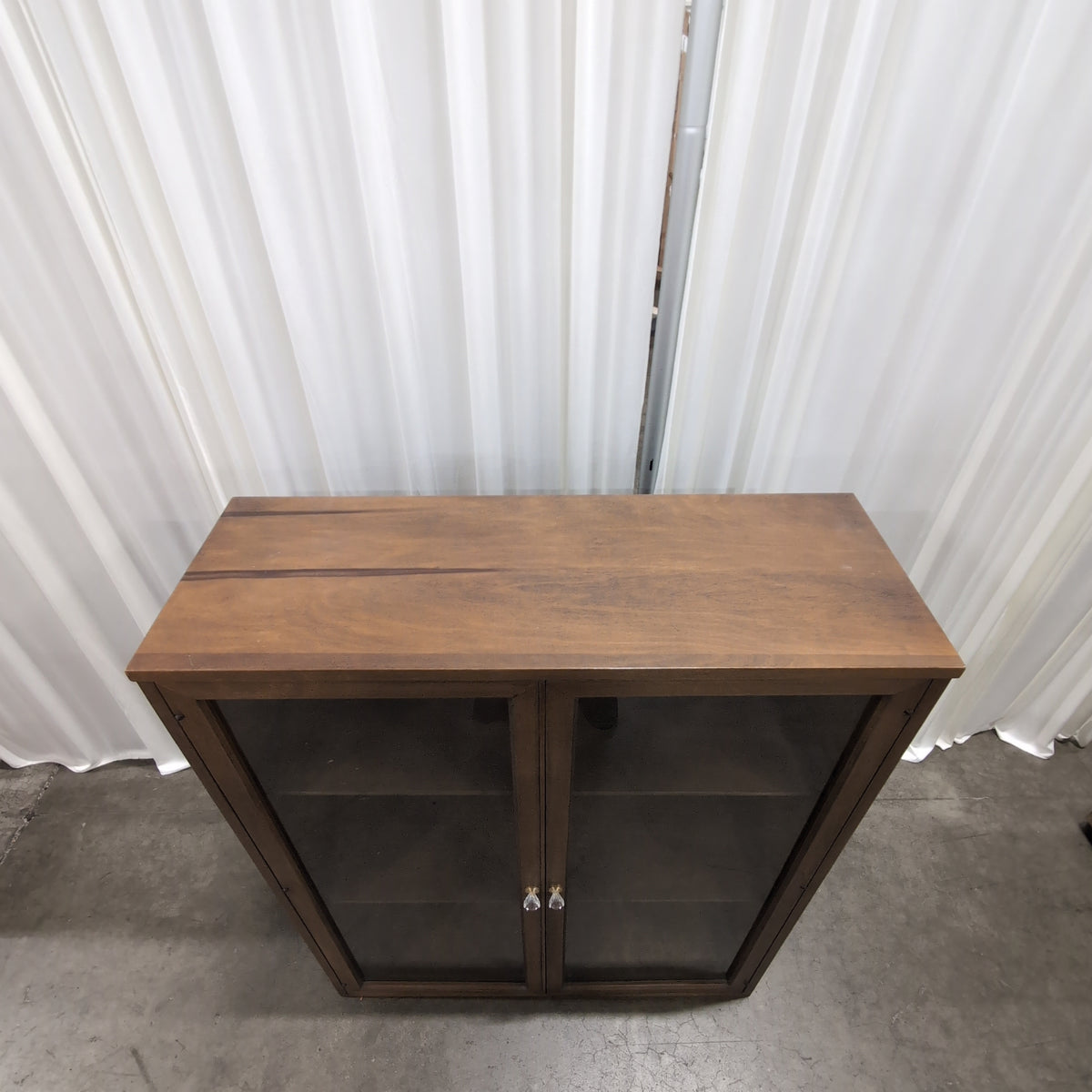 Brown Wood Two-Door China Cabinet with Glass Panels