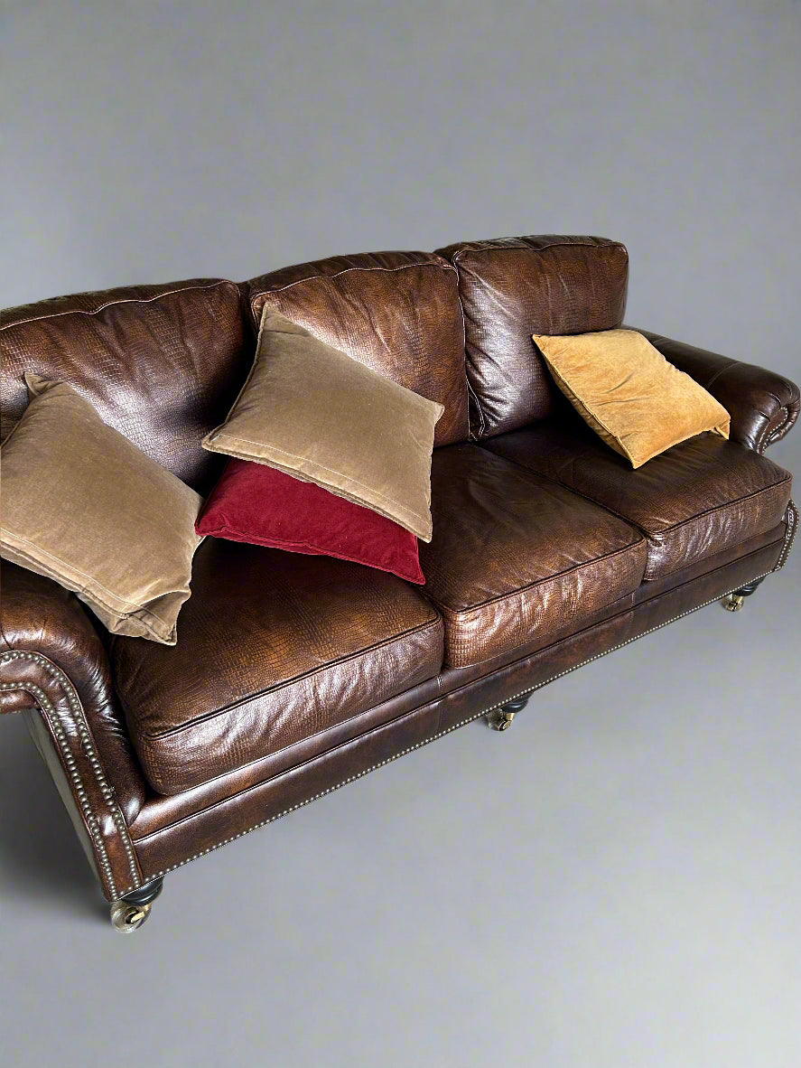 Brown Embossed Leather Couch On Casters