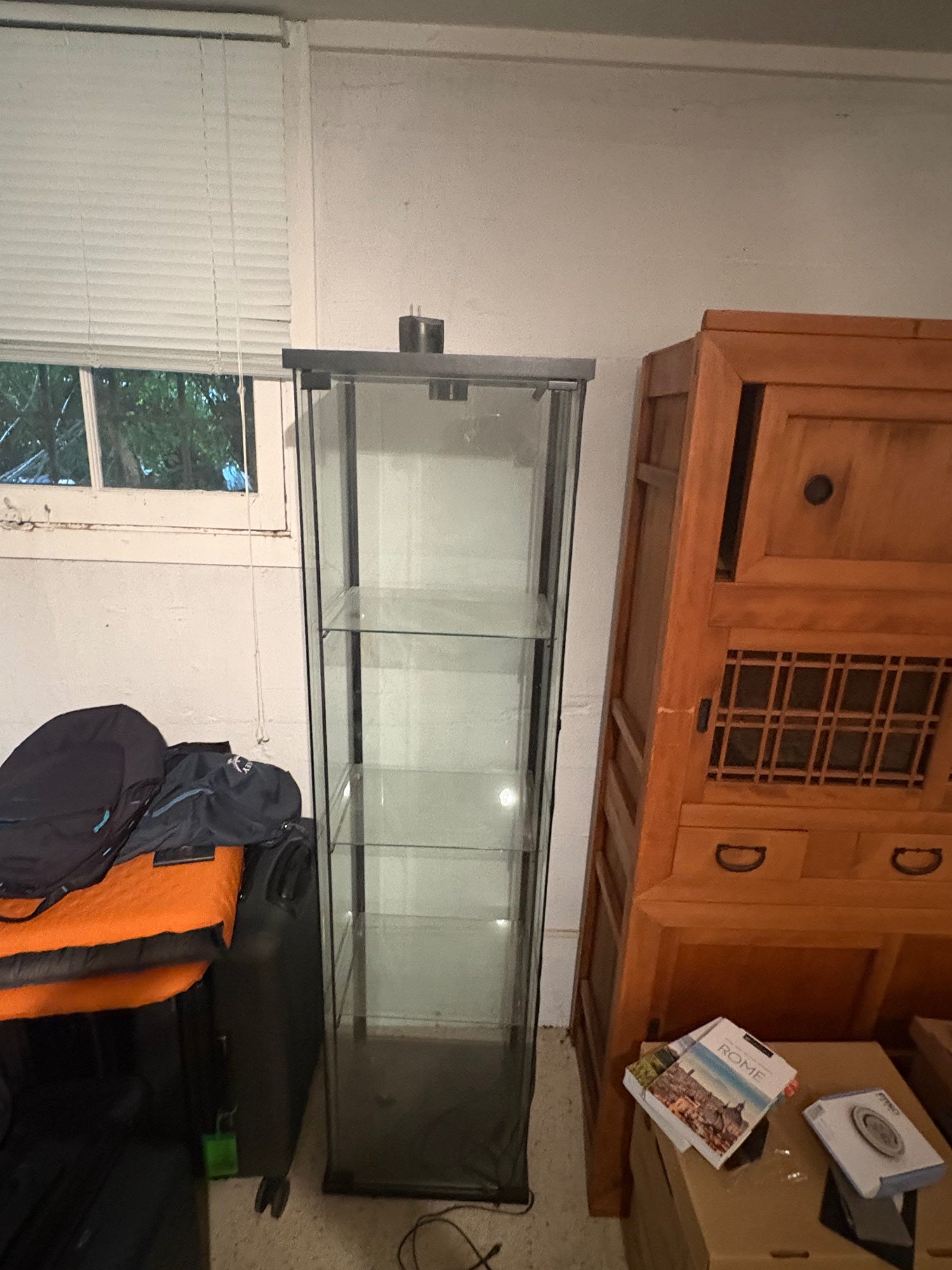 Sleek Glass Display Cabinet with Black Frame