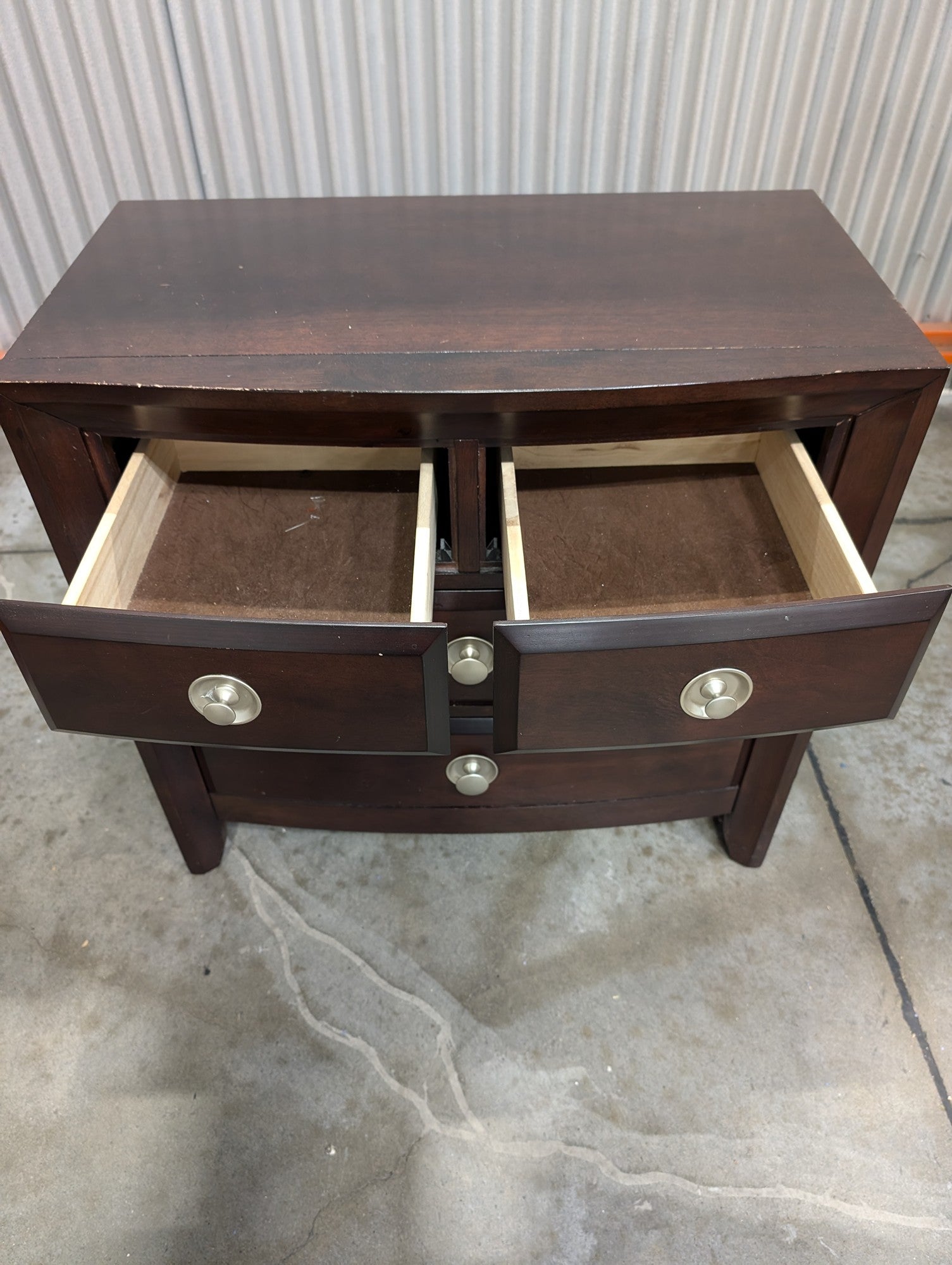 Rich Brown Wood Nightstand with Curved Drawer Fronts