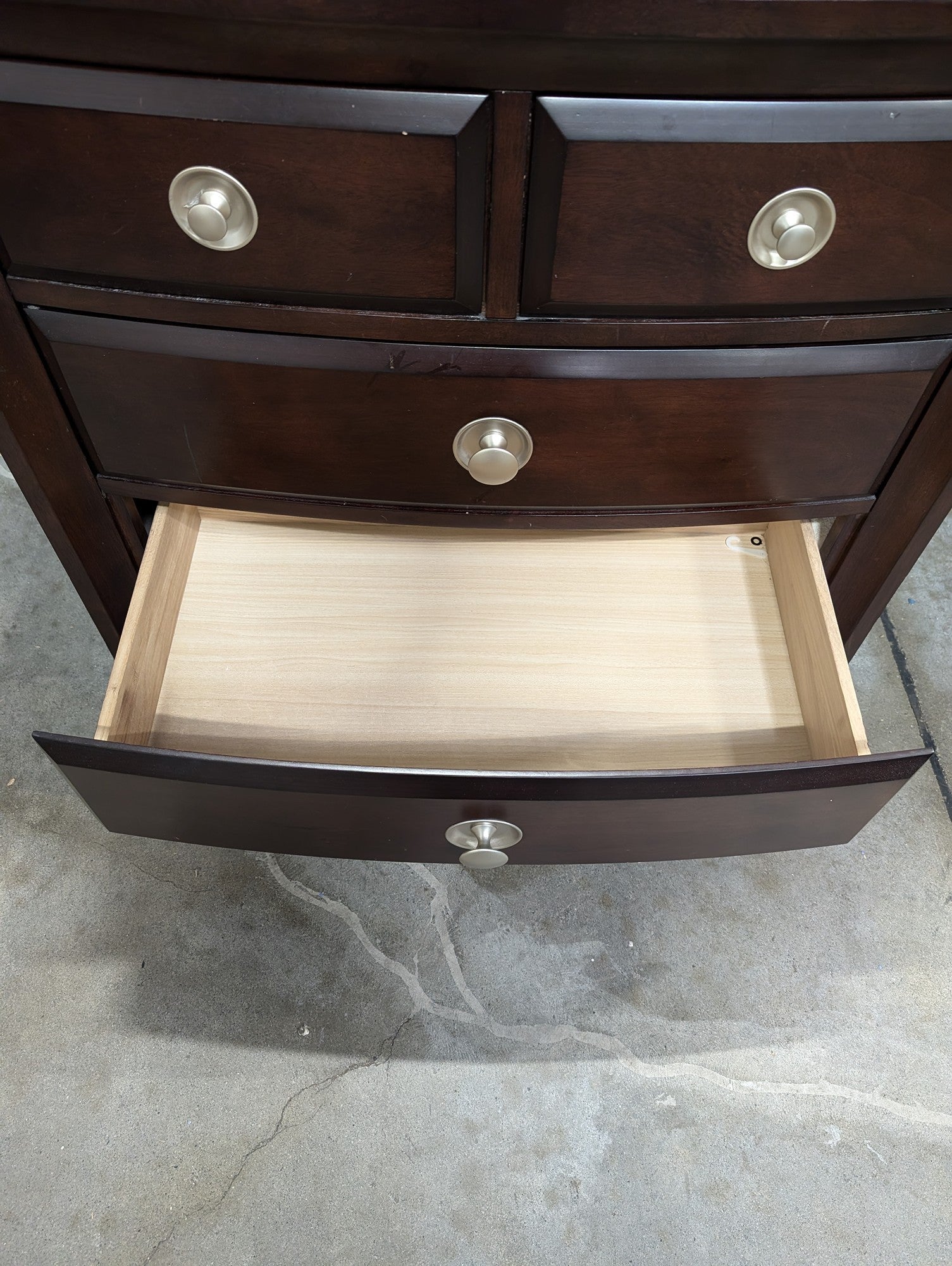 Rich Brown Wood Nightstand with Curved Drawer Fronts
