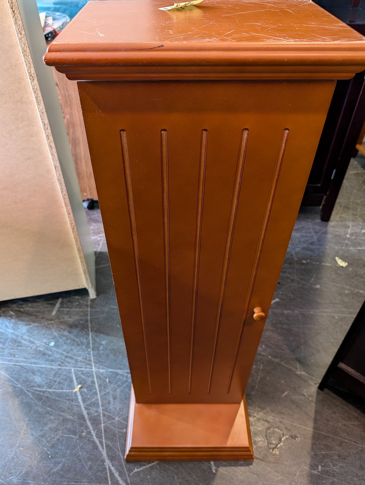 Slender Wooden Storage Cabinet with Grooved Door