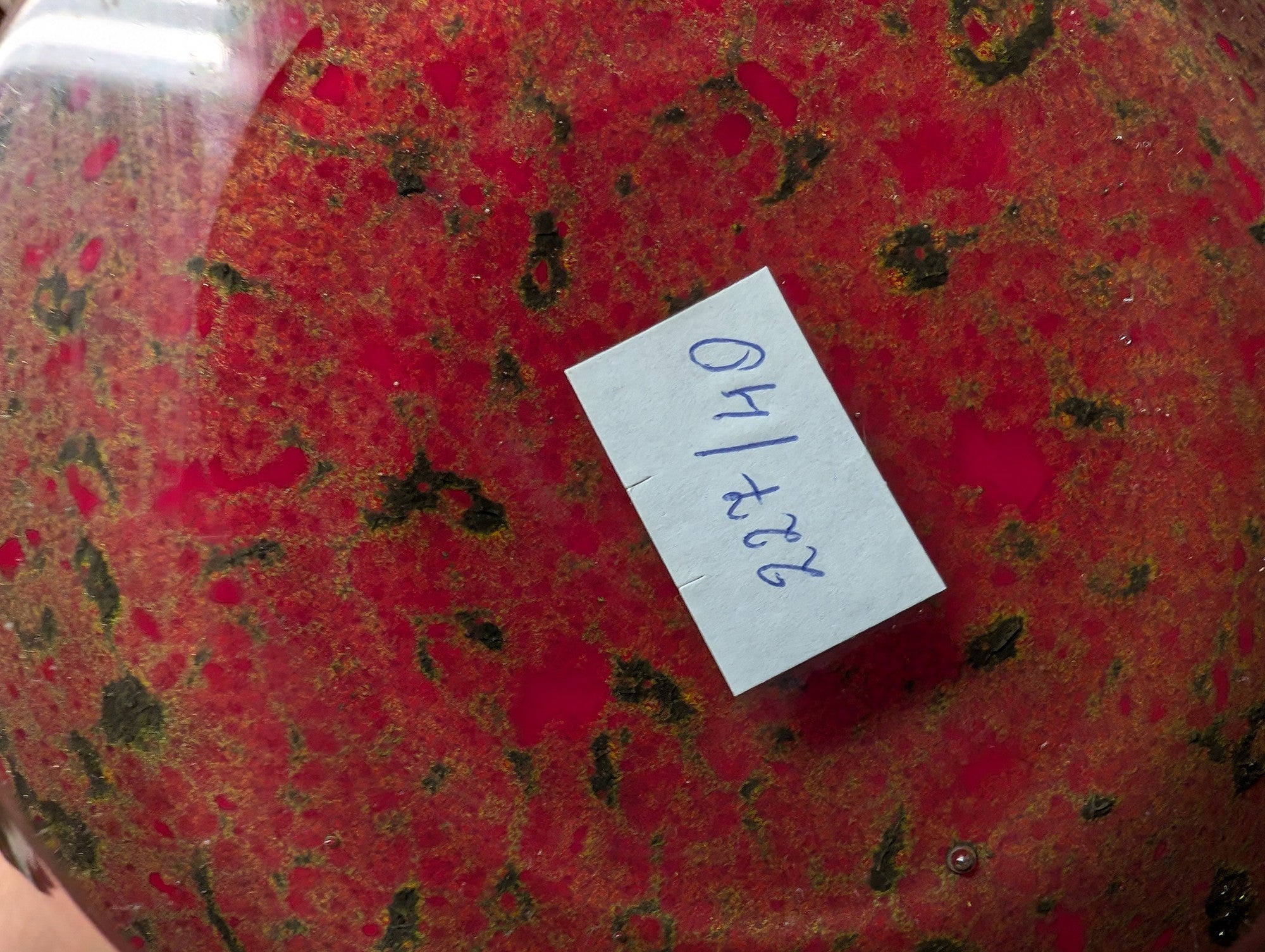 Vibrant Red Art Glass Vase with Streaked Design