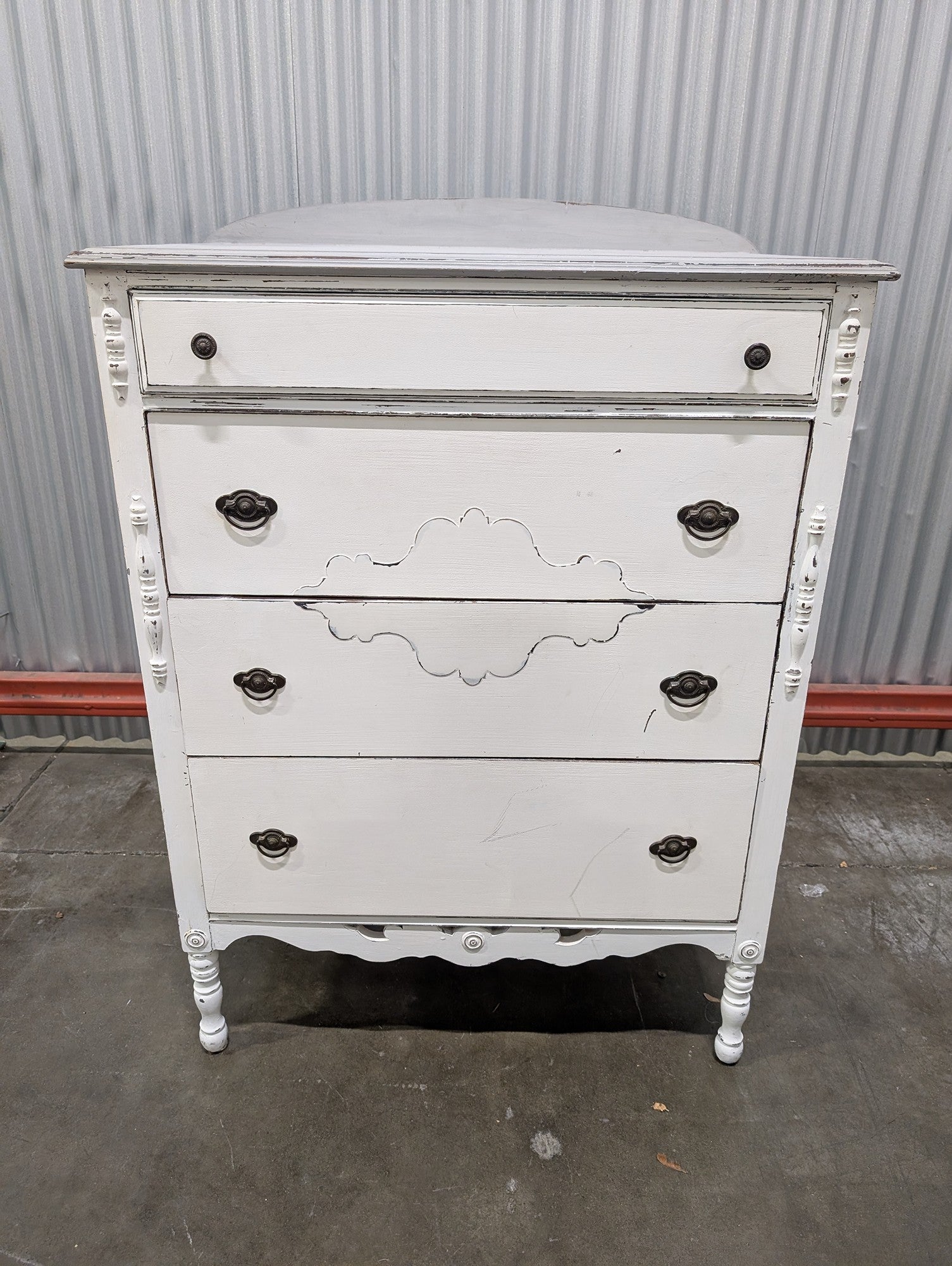 Distressed White Four-Drawer Chest with Carved Details
