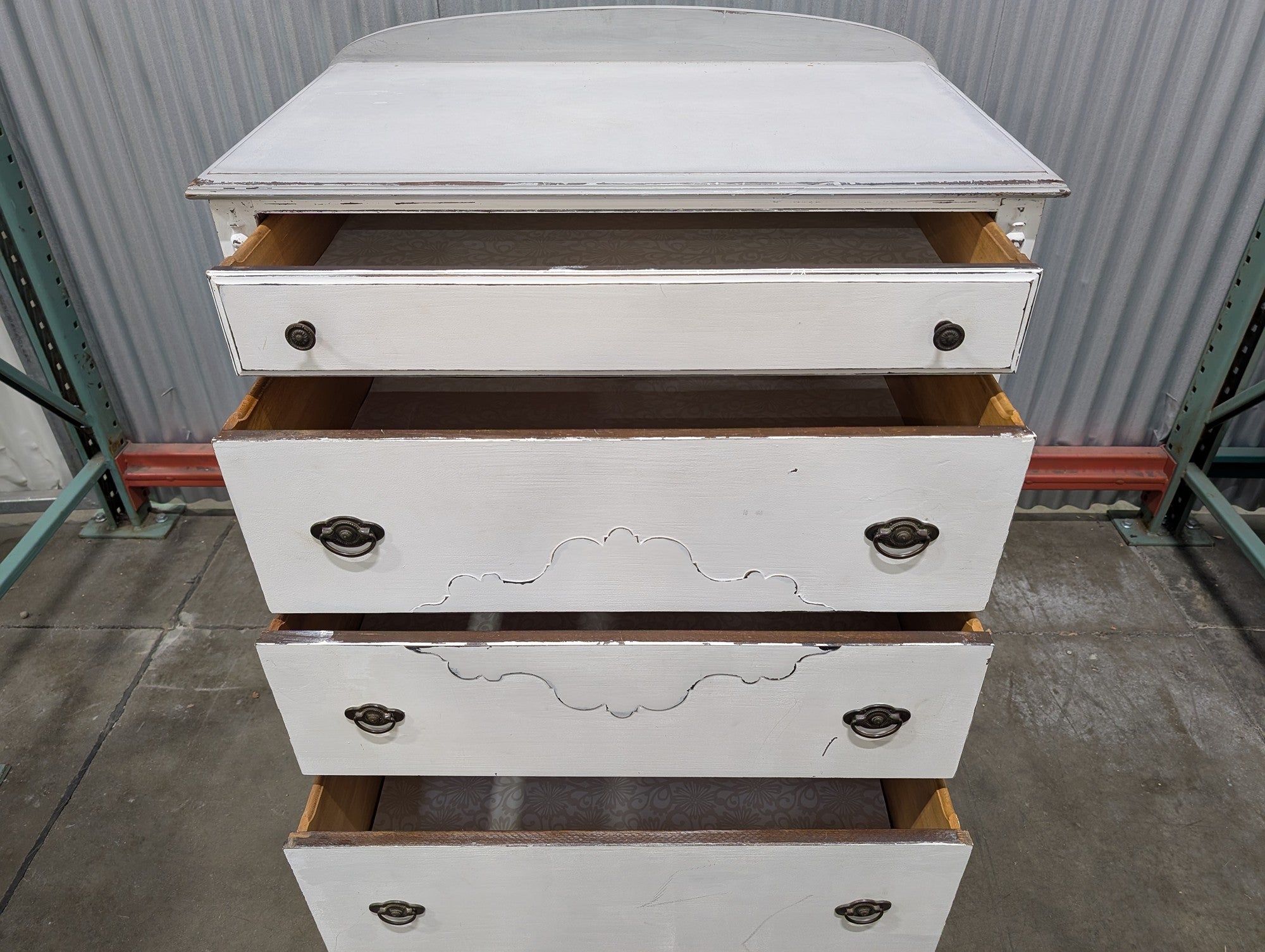 Distressed White Four-Drawer Chest with Carved Details