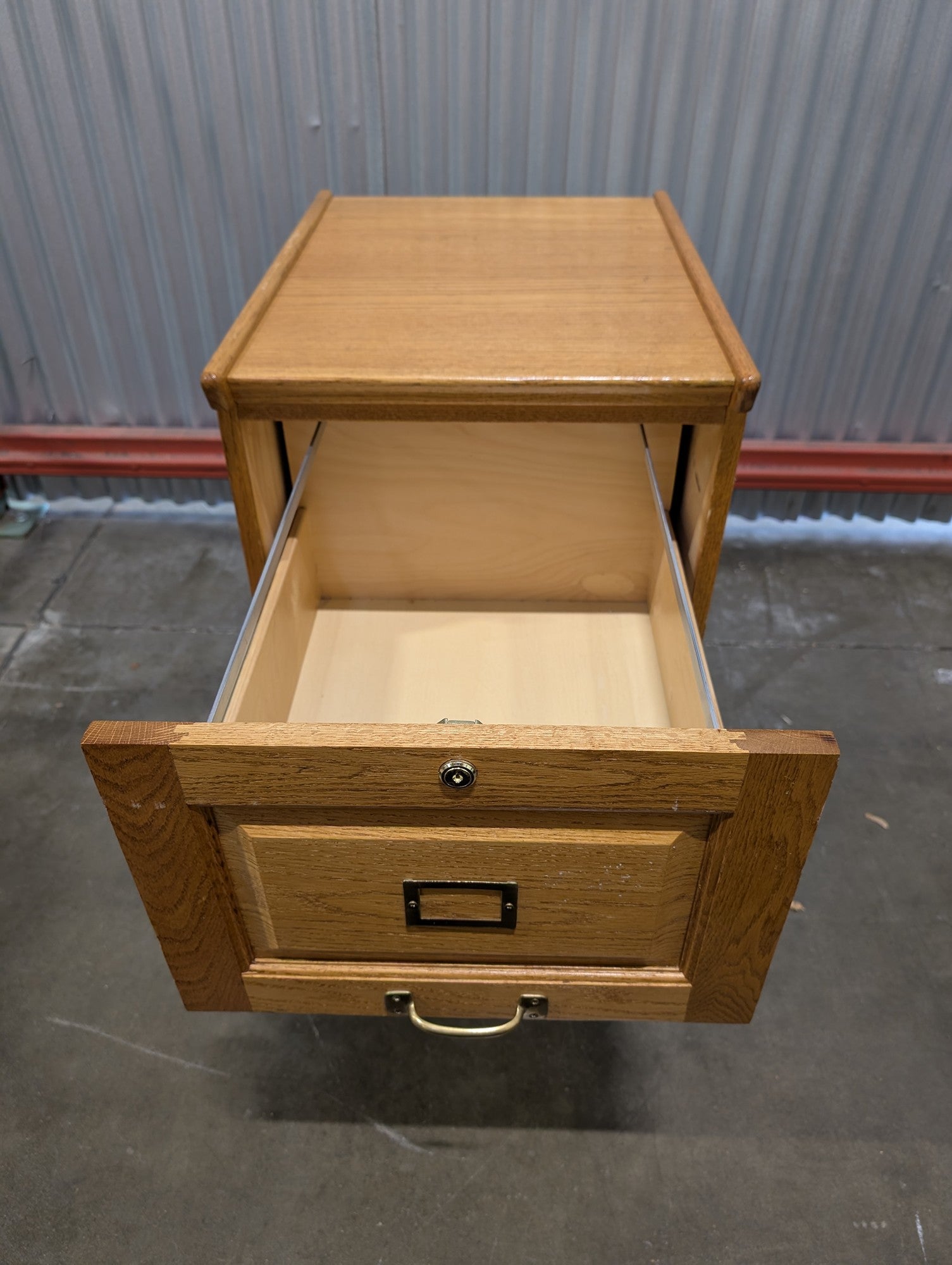 Sturdy Oak Two-Drawer Filing Cabinet with Brass Hardware