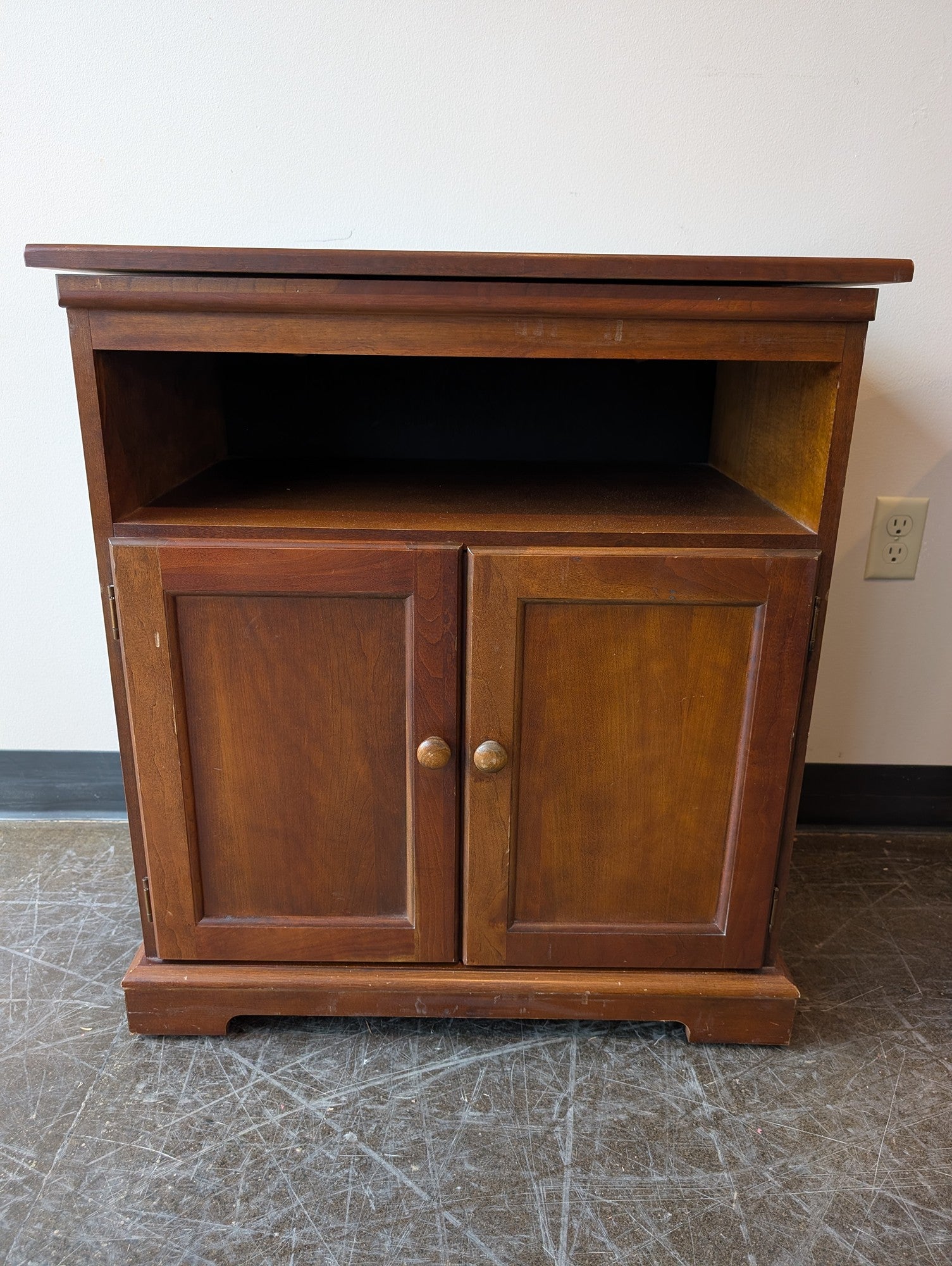 Compact Brown Wood Storage Cabinet with Spinning Top