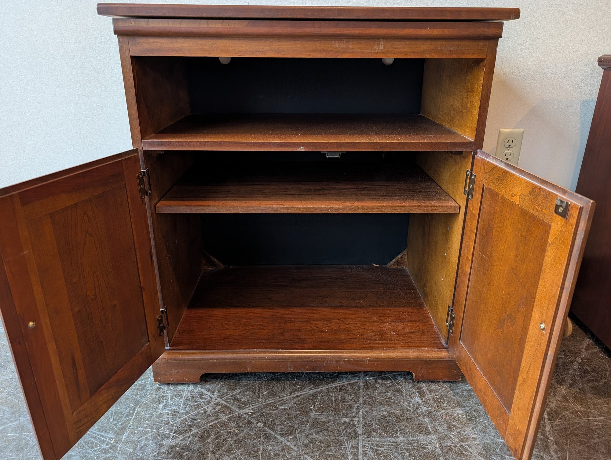 Compact Brown Wood Storage Cabinet with Spinning Top
