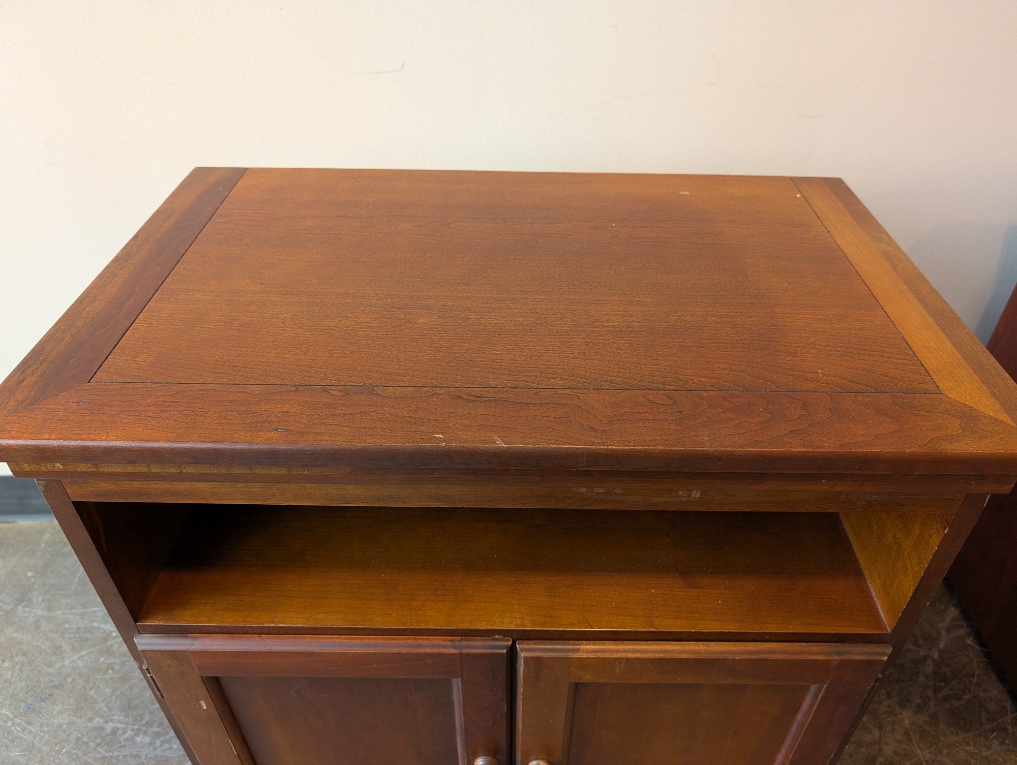 Compact Brown Wood Storage Cabinet with Spinning Top