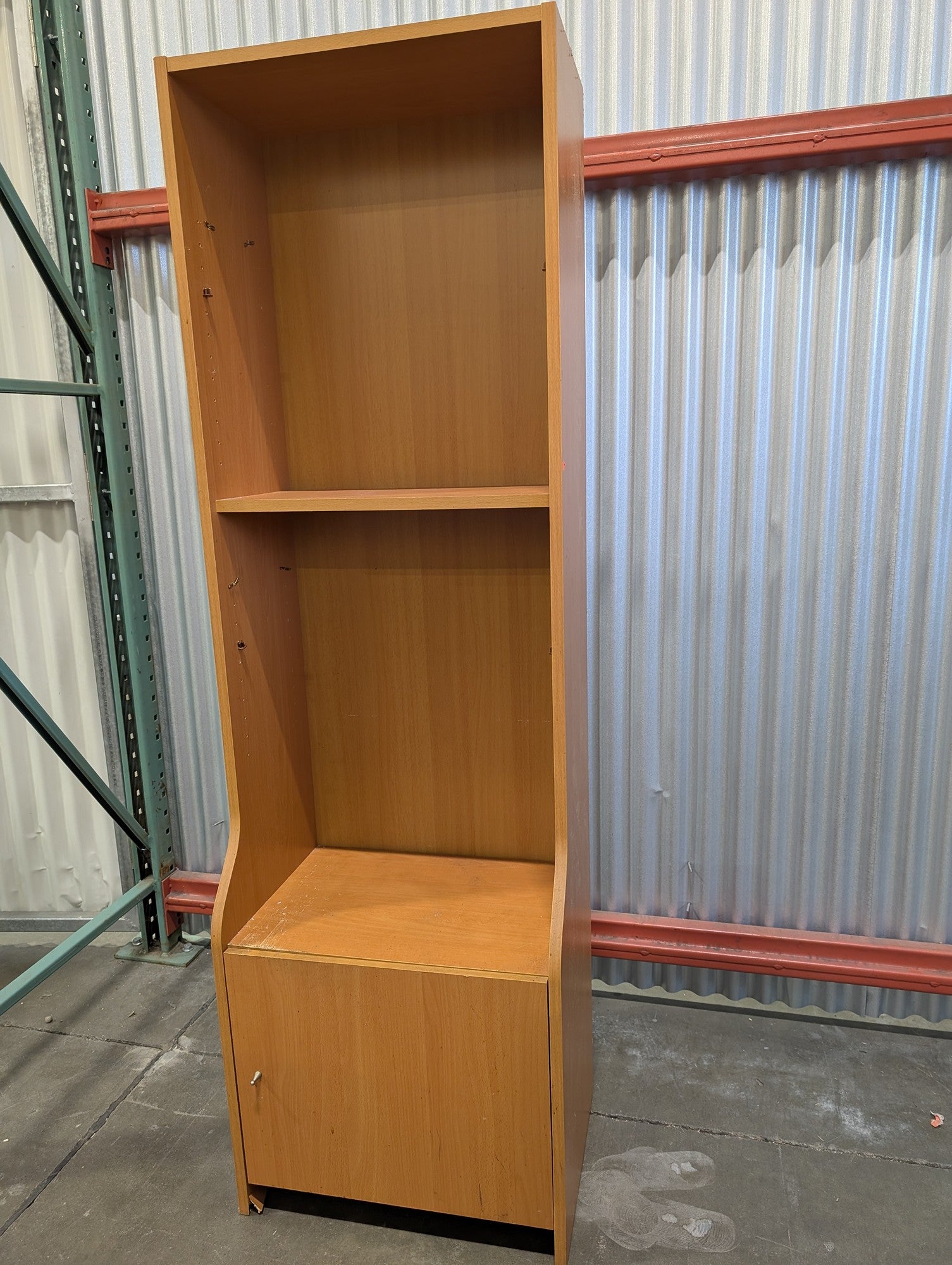 Functional Light Wood Bookcase with Integrated Cabinet