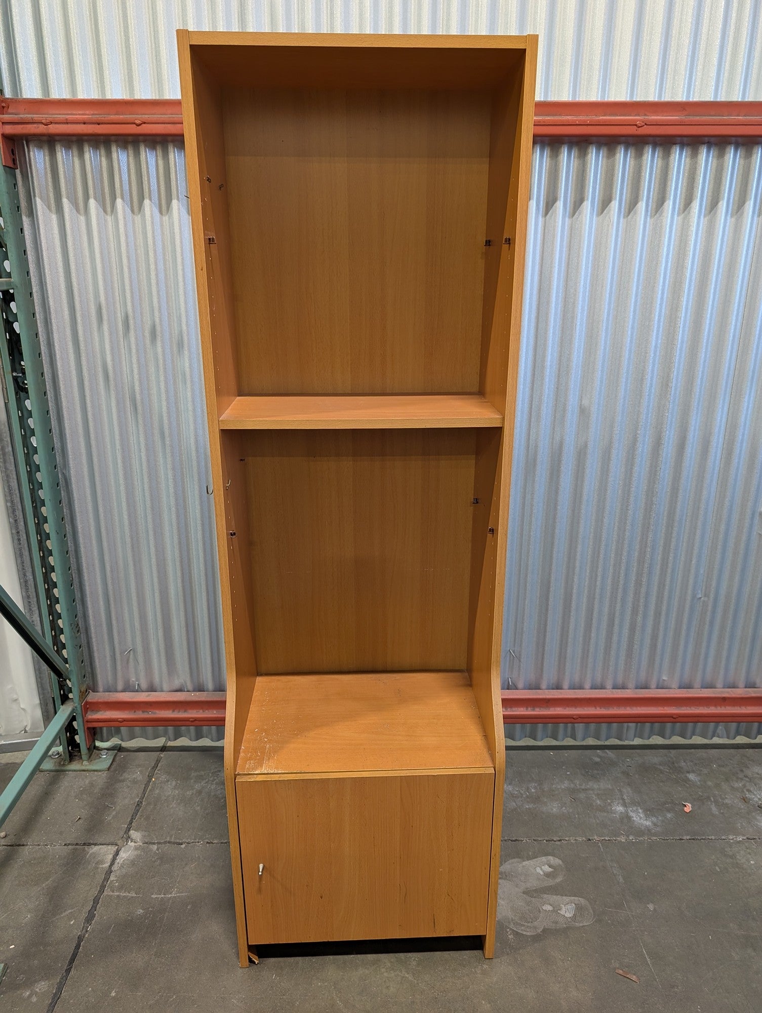 Functional Light Wood Bookcase with Integrated Cabinet