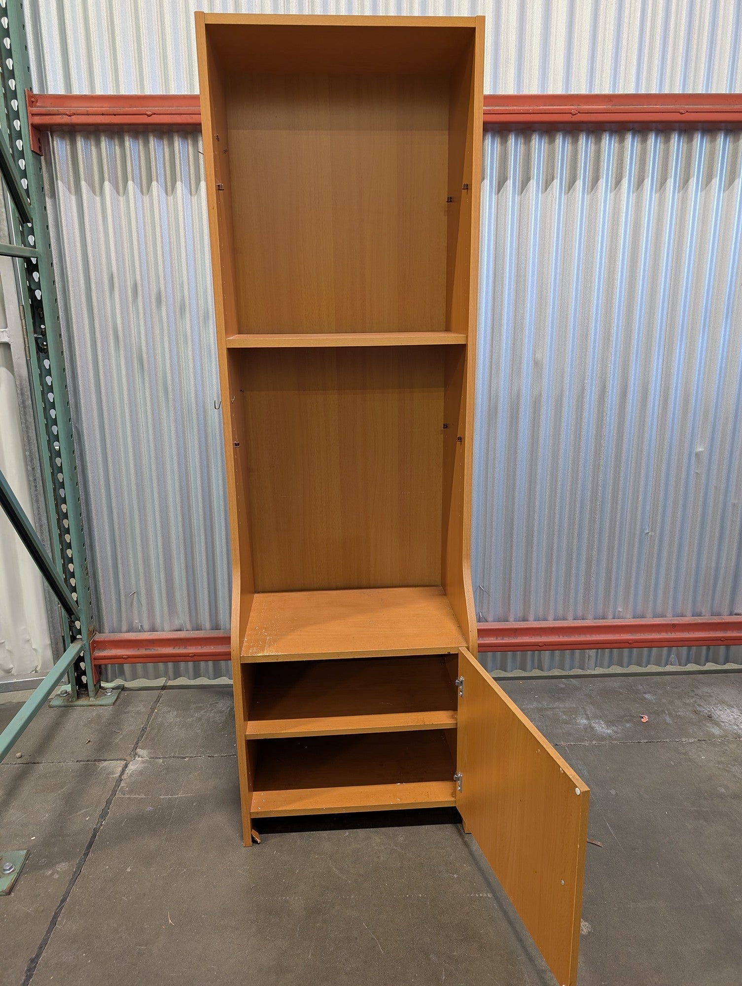 Functional Light Wood Bookcase with Integrated Cabinet