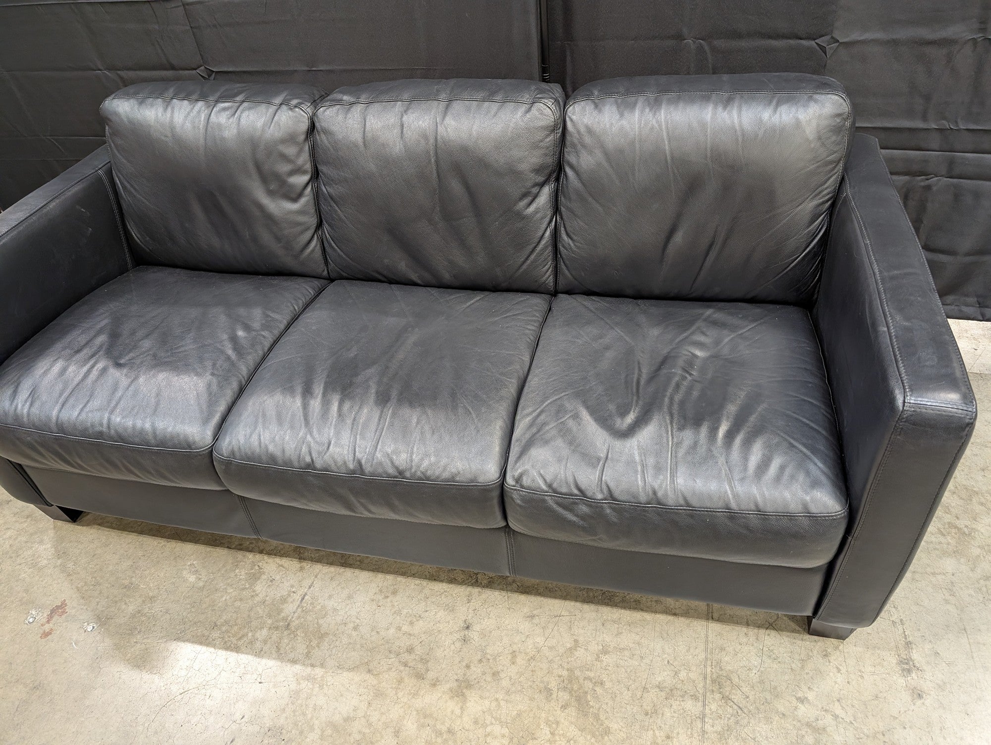 Modern Black Leather Three-Seater Sofa