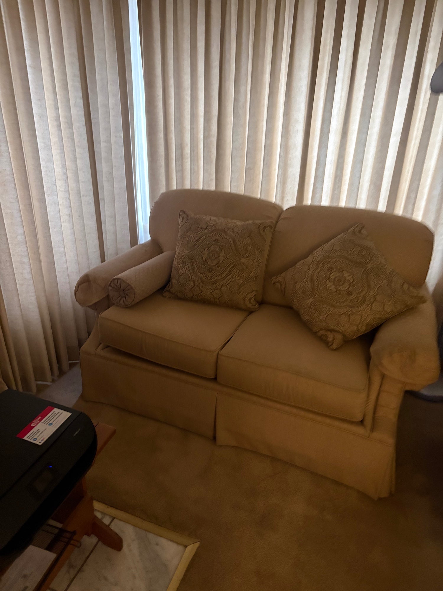 Classic Tan Two-Seater Sofa with Rolled Arms