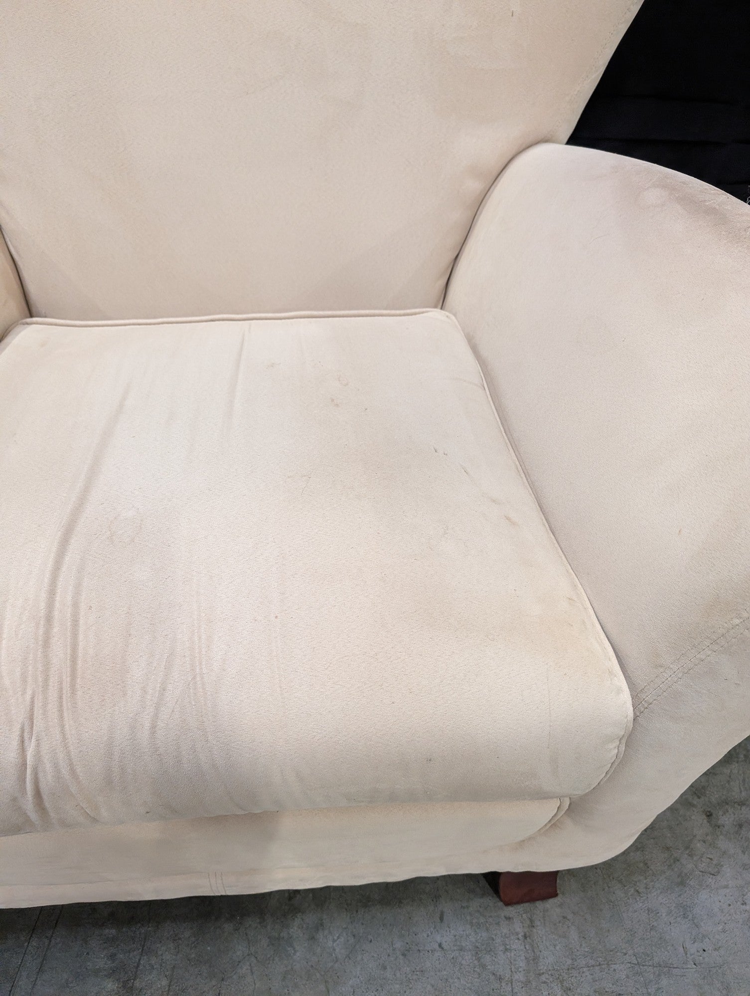Cream Upholstered Club Chair with Rolled Arms and Flared Back