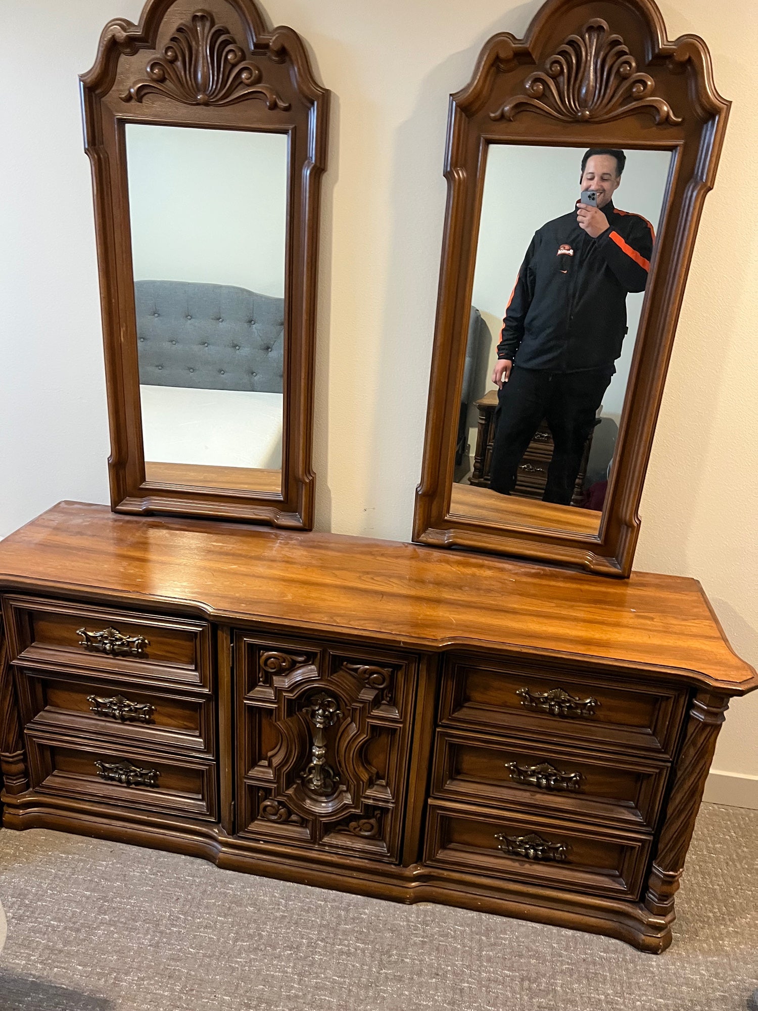 Ornate Traditional Dark Wood Dresser with Nine Drawers and Two Carved Mirrors