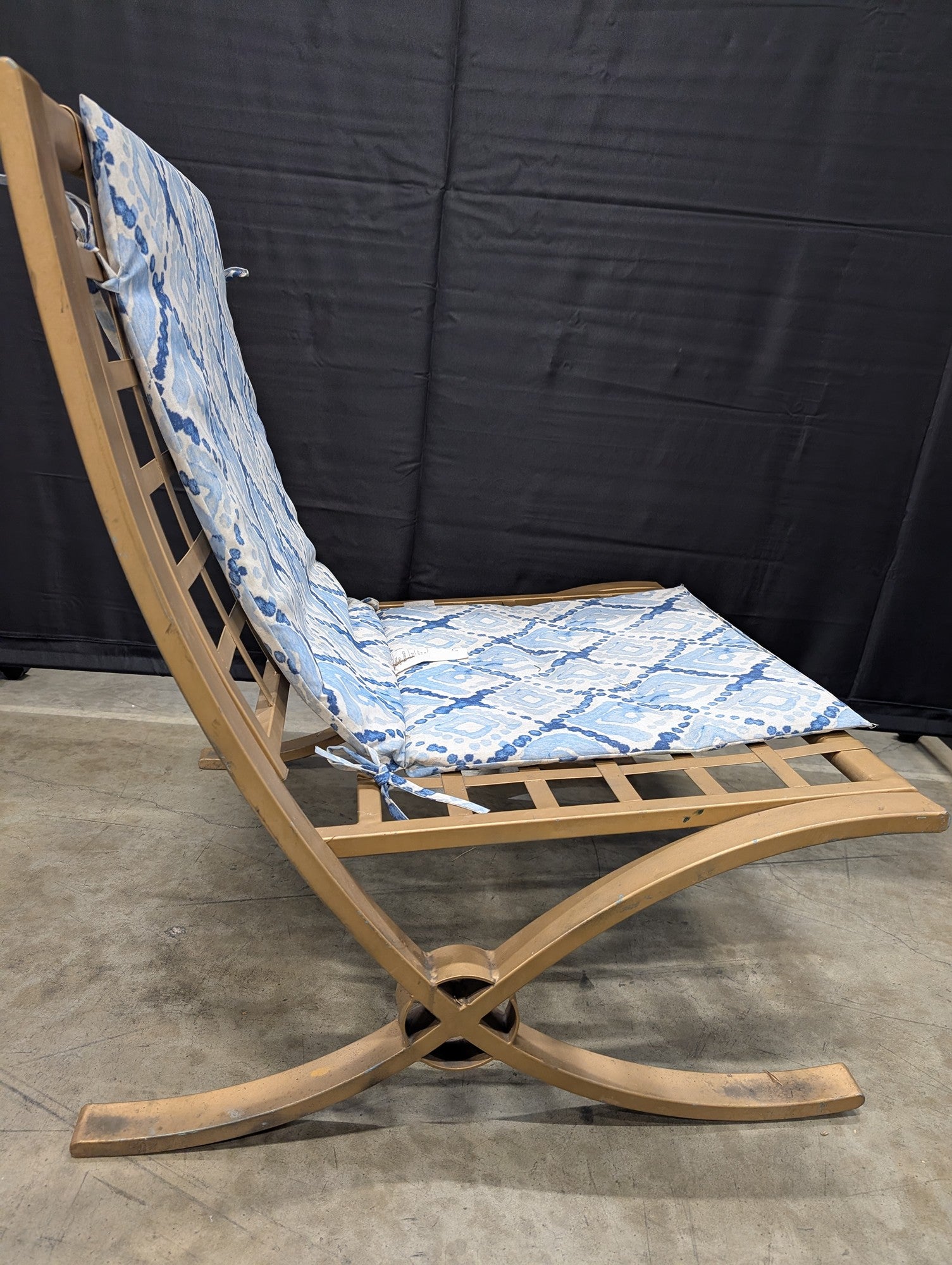 Outdoor Metal Chaise Lounge with Blue Ikat Patterned Cushion
