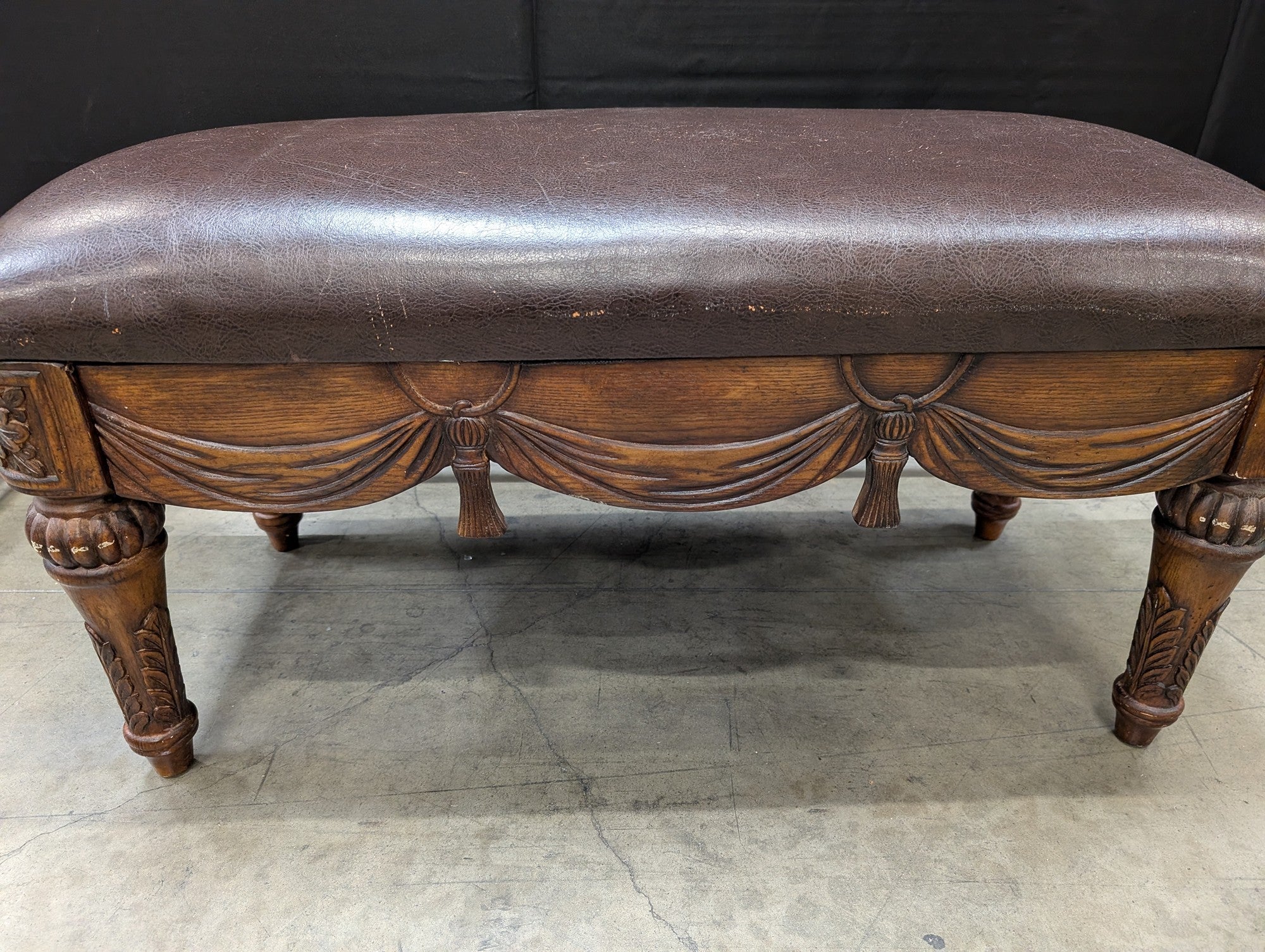 Ornate Carved Wood and Brown Upholstered Bench