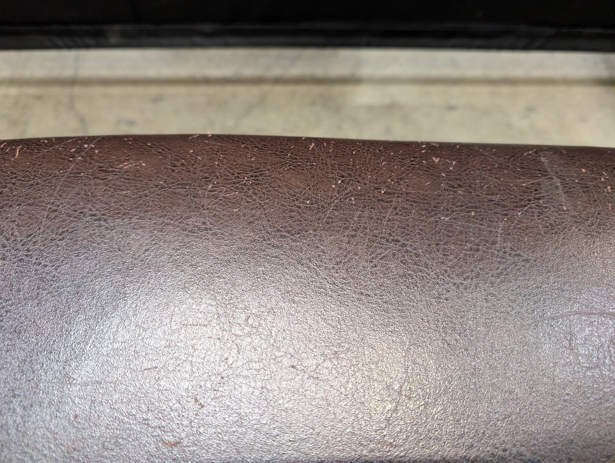 Ornate Carved Wood and Brown Upholstered Bench
